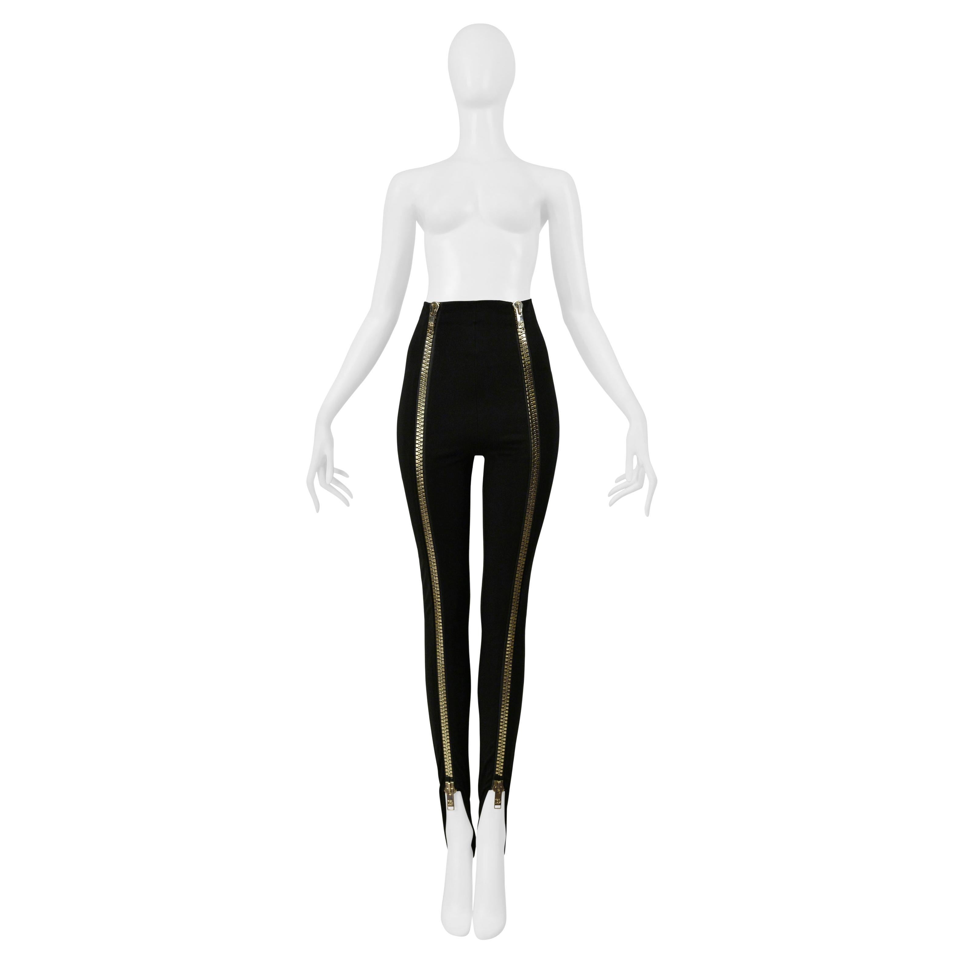 Dolce 
Gabbana Legging noir à étriers avec fermetures éclair géantes dorées en vente