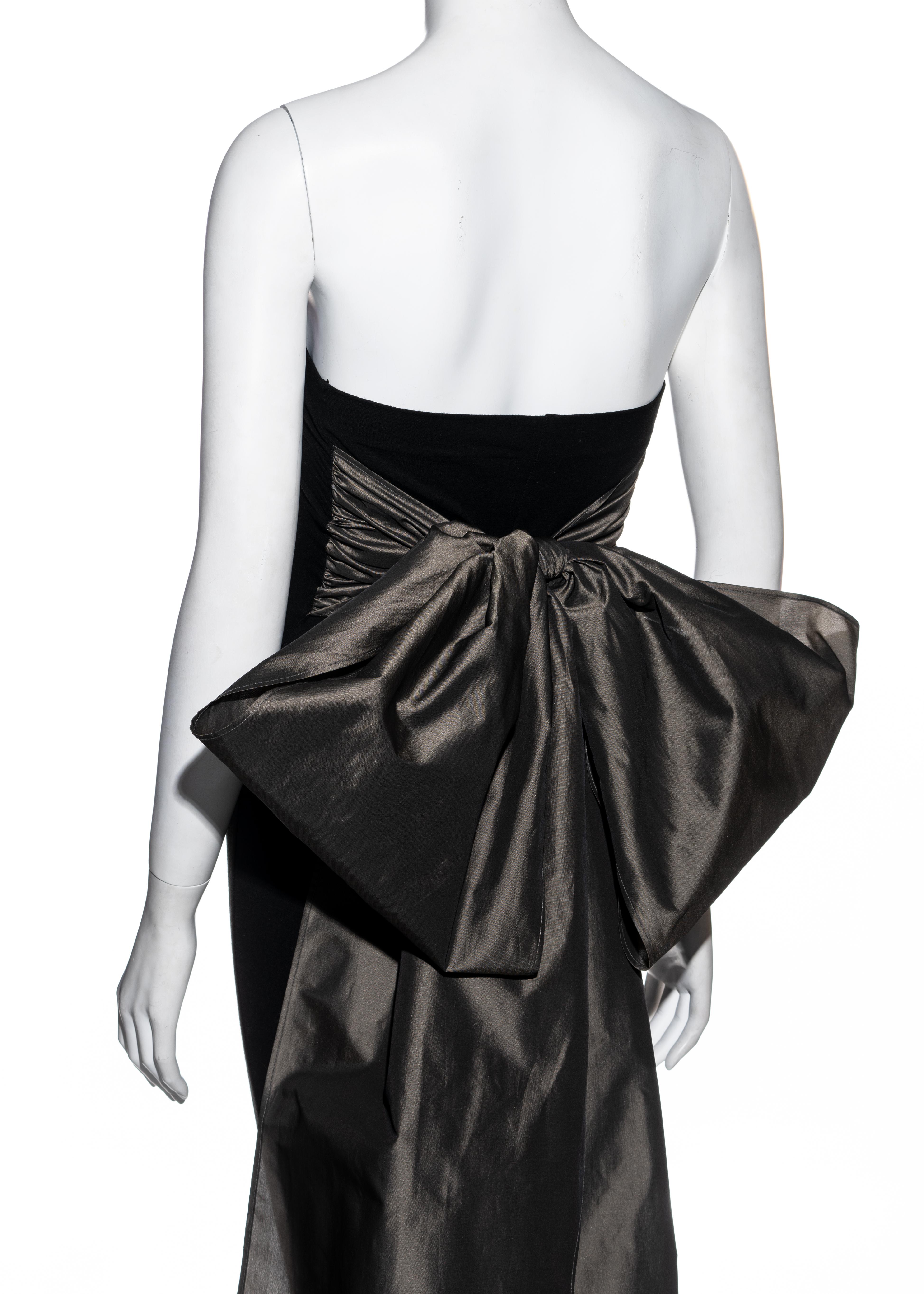 Black Dolce & Gabbana black strapless jumpsuit with large taffeta bow, fw 1991