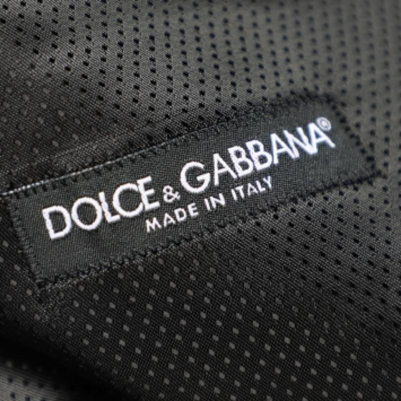 Dolce & Gabbana Chaleco con botones de lana a rayas negro M Negro en venta