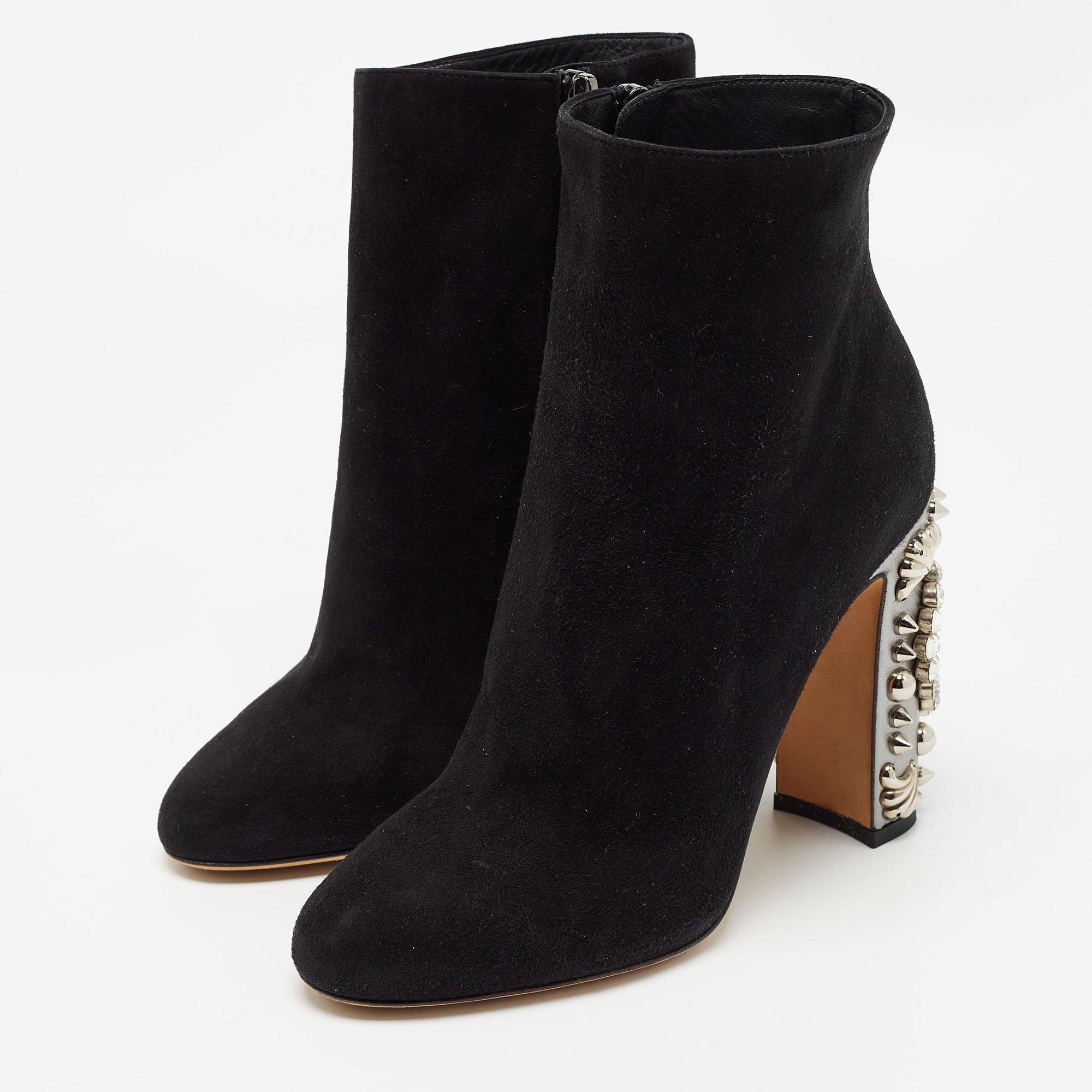 Designed by Dolce & Gabbana, these boots have the perfect fusion of class and comfort. They are created from suede with an gun metal-tone accents and the 11cm crystal-embellished heels will lend you confident steps.

