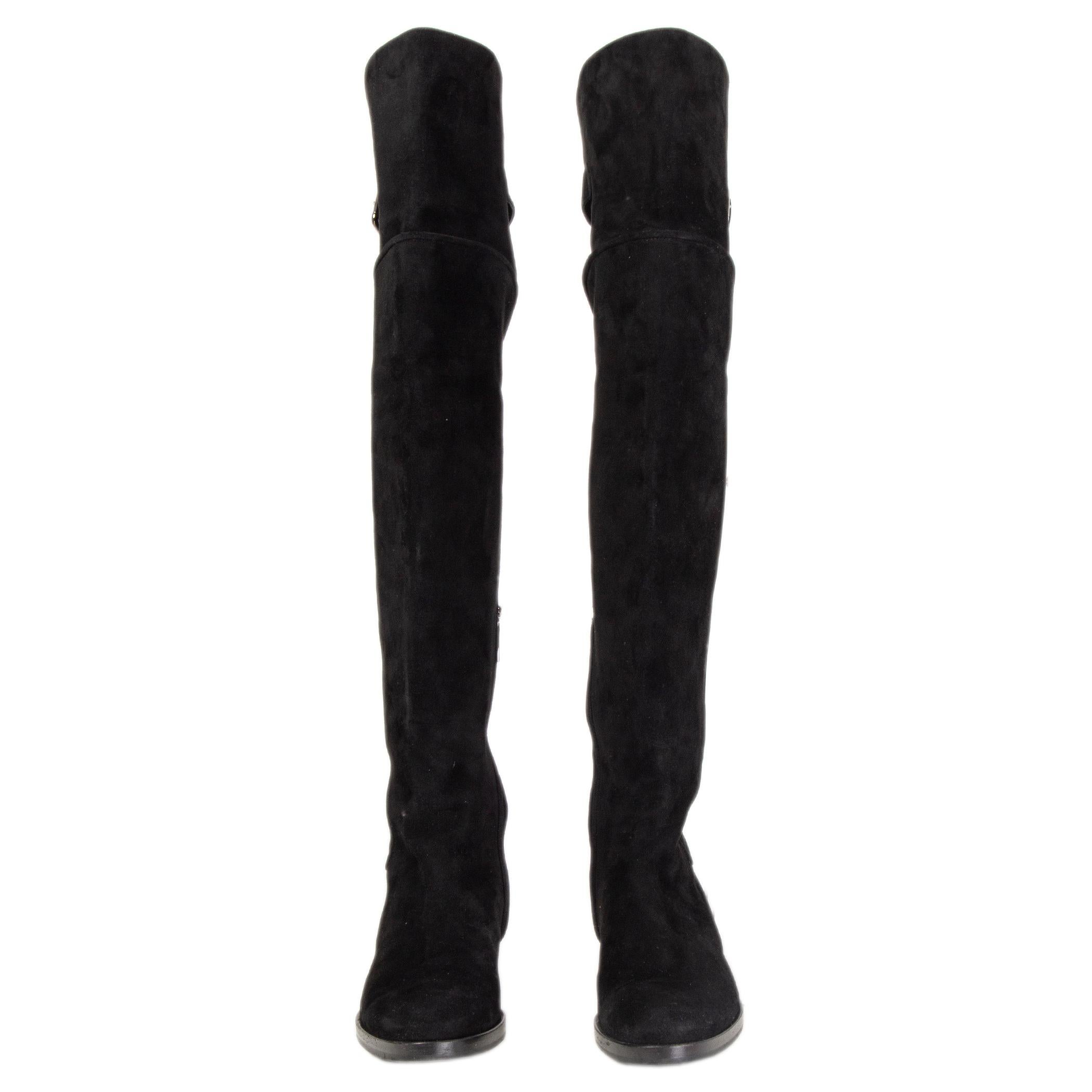 100% authentic Dolce & Gabbana over-knee boots in black suede with buckle fatening on the back. Open with a zipper among the inside. Have been worn and are in excellent condition. 

Measurements
Imprinted Size	38
Shoe Size	38
Inside Sole	25cm