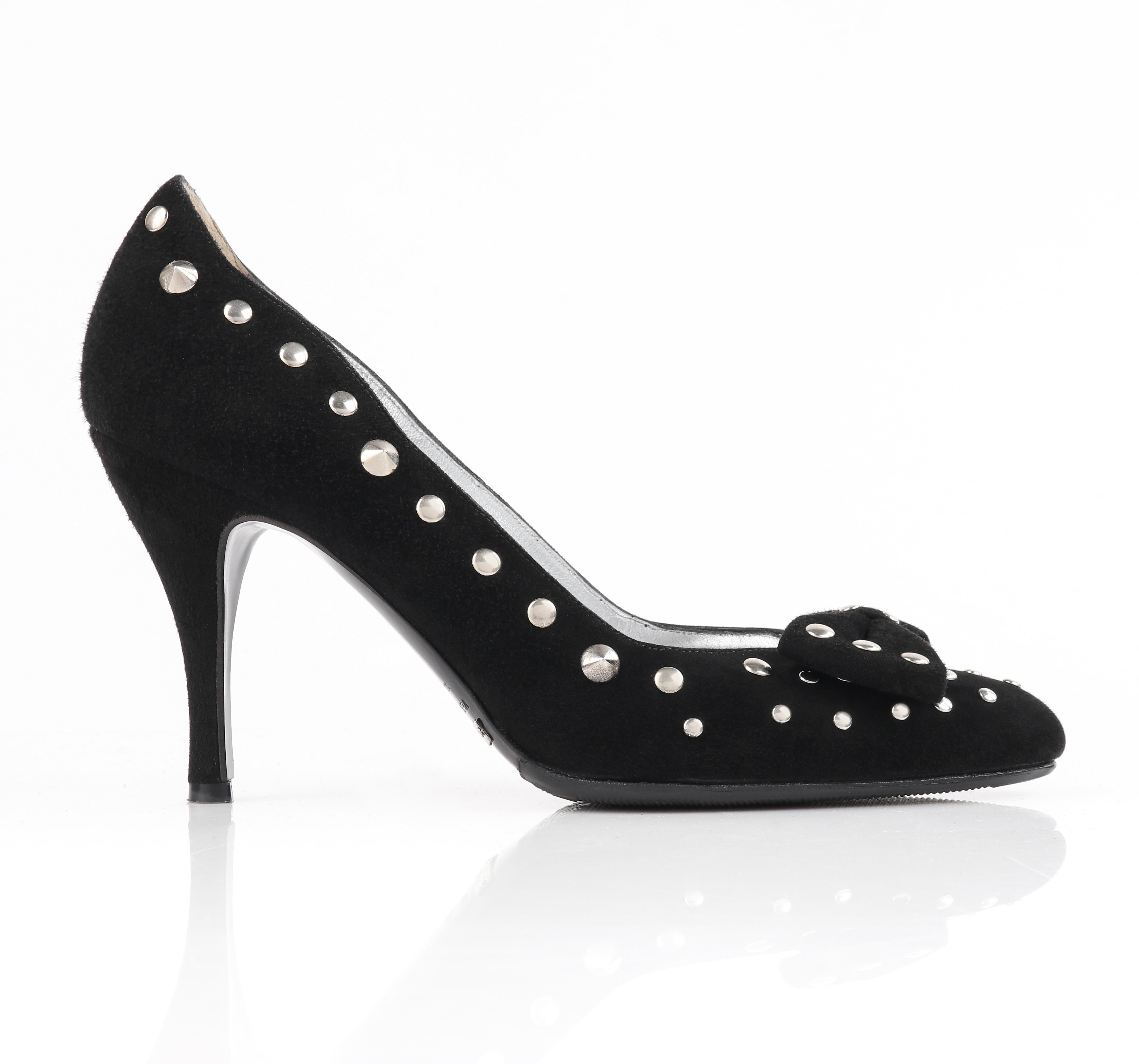 DOLCE & GABBANA Black Suede Silver Studded Vamp Bow Almond Toe Pumps Heels

Estimated Retail: $495.00
 
Brand / Manufacturer: Dolce & Gabbana
Style: Pump / heel
Color(s): Black; silver (interior, studs)
Lined: Yes
Unmarked Fabric Content: Suede