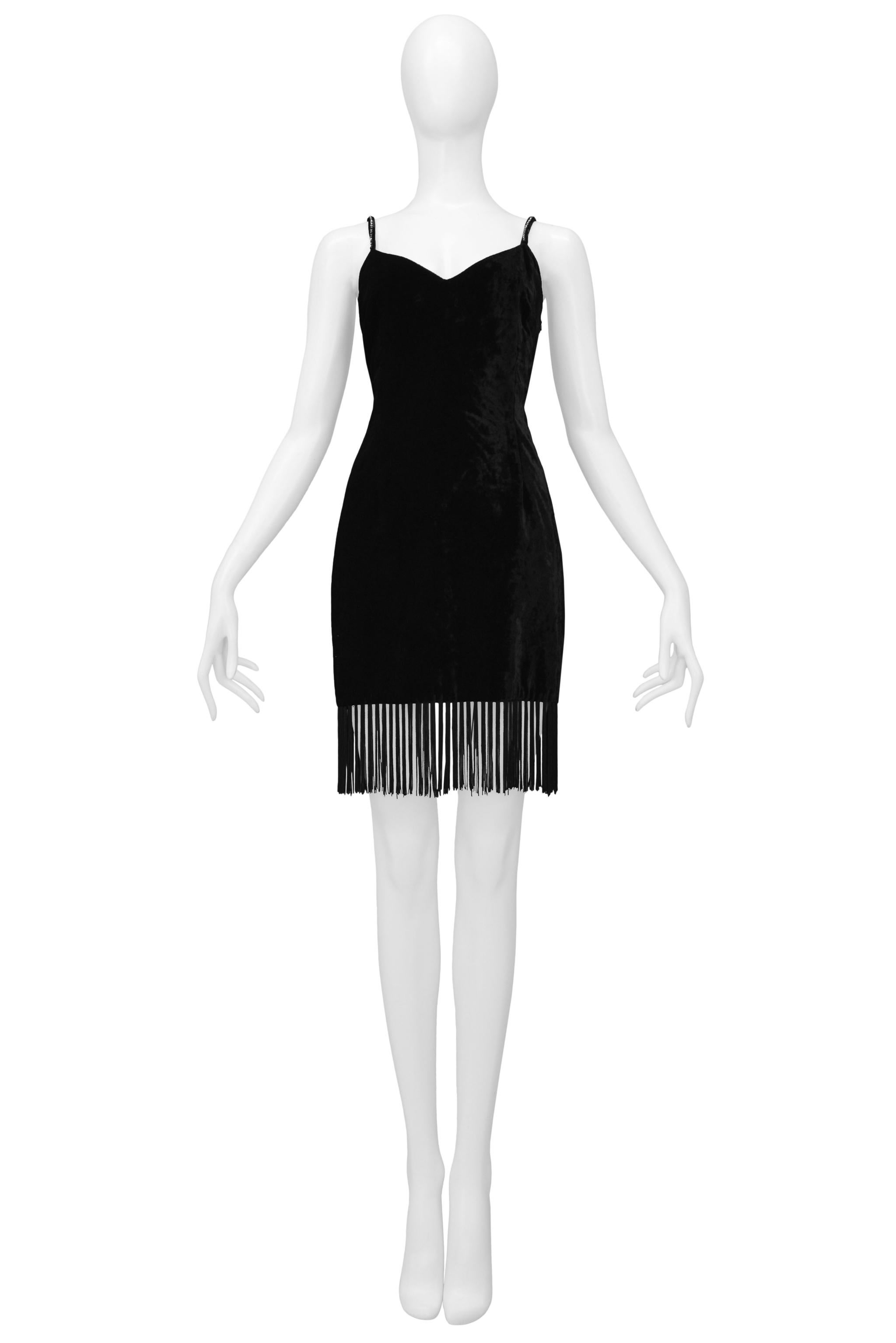Resurrection Vintage is excited to offer a vintage Dolce & Gabbana black velvet slip dress featuring a fitted body, skinny straps with rhinestones, a fringe hem, and knee-length. 

Dolce & Gabbana
Size 42
Viscose, Cotton, Modal
Excellent Vintage