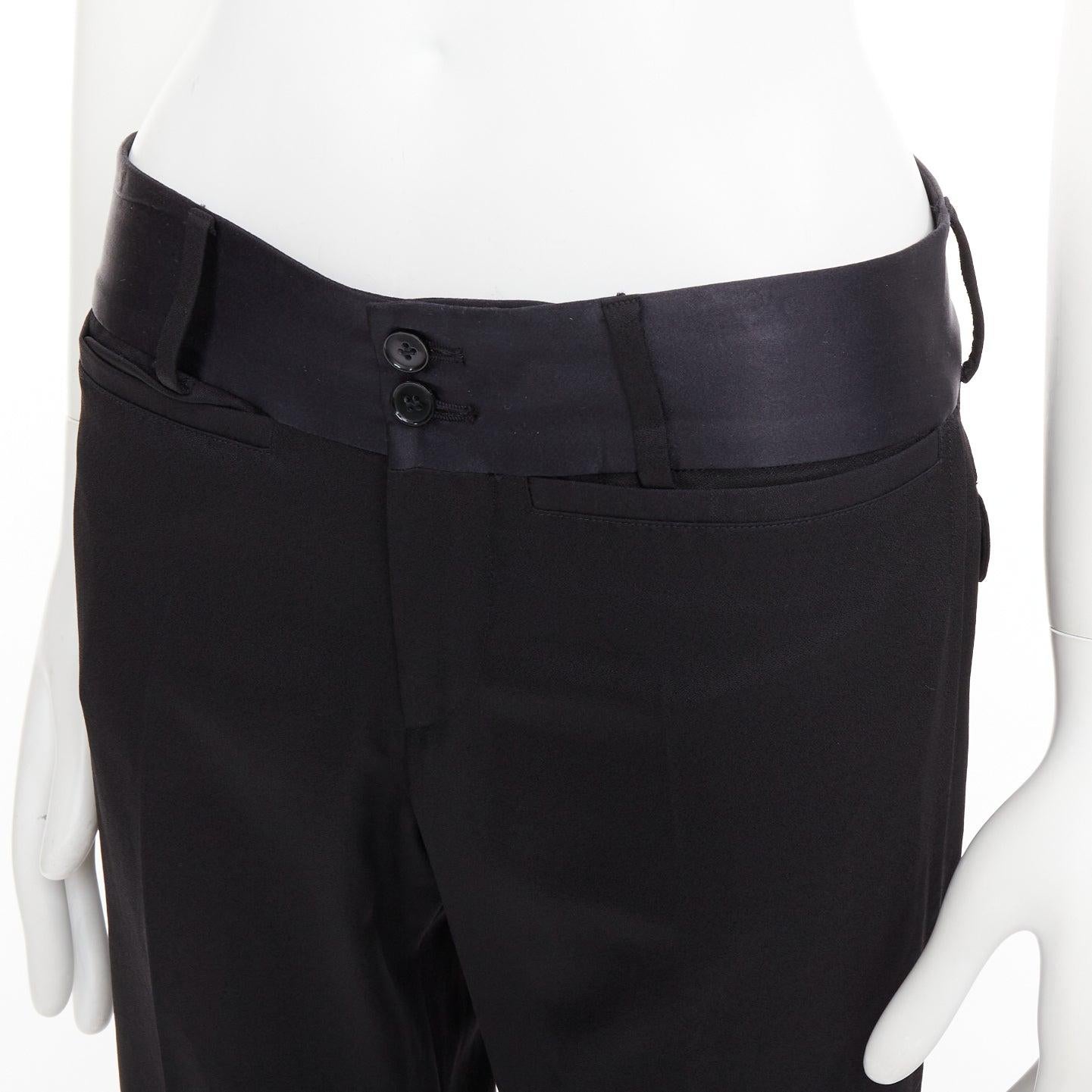 Dolce & Gabbana pantalon de smoking noir en laine vierge mélangée avec taille en satin IT44 XS
Référence : SYYG/A00017
Marque : Dolce Gabbana
Designer : Domenico Dolce et Stefano Gabbana
MATERIAL : Laine vierge
Couleur : Noir
Motif :