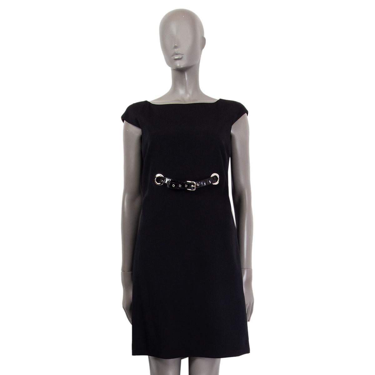 Dolce & Gabbana cap sleeve dress in black acetate (71%), elastane (5%) and nylon (24%) with a wide neckline and a front patent leather decorative waist belt. Closes on the back with a zipper. Lined in leopard print cupro (84%) and elastane (16%).