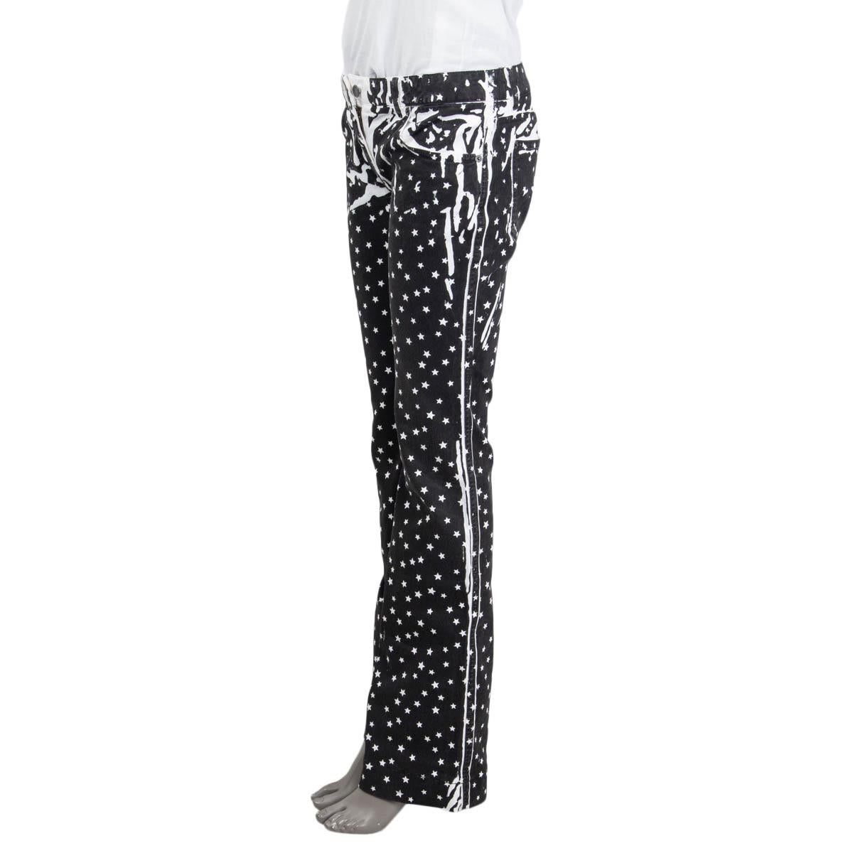 100% authentic Dolce & Gabbana star printed flared denim jeans in black and white cotton (98%) and elastane (2%). Feature two slit pockets on the front and two patch pockets on the back. Open with a button and a concealed zipper on the front.