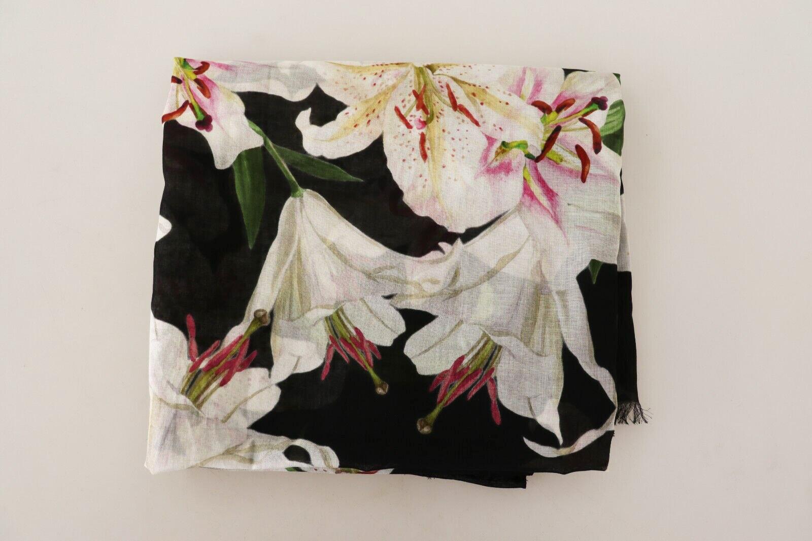 Gorgeous brand new with tags, 100% Authentic Dolce & Gabbana women scarf with lilies print crafted from cotton.


Gender: Women
Color: Black with lilies print
Material: 100% Cotton

Logo details
Made in Italy

Size: 110cm x 185cm

Original tags