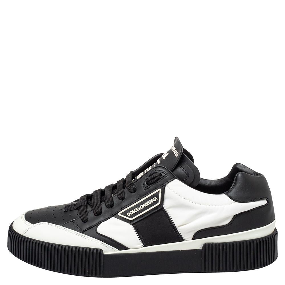 Verleihen Sie Ihrem Alltag einen luxuriösen Touch mit diesen Sneakers von Dolce&Gabbana. Sie sind sowohl aus Leder als auch aus Nylon gefertigt und stehen auf Gummisohlen. Schnüren Sie sie und kombinieren Sie sie mit Ihrem bevorzugten