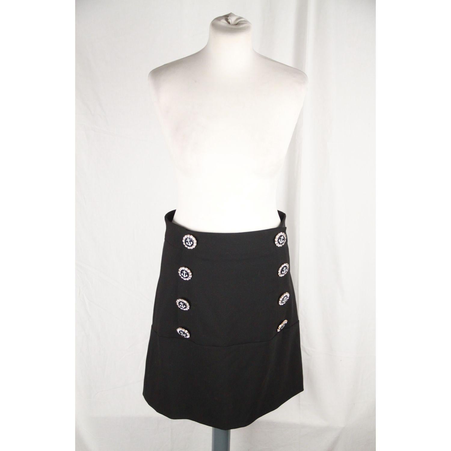 Black wool-blend - Concealed hook and zip fastening at back - 99% wool, 1% elastane - Dry clean - Made in Italy - Dolce & Gabbana's skirt playfully nods to sailor uniforms with its crystal-embellished anchor buttons that frame the hips - It's cut