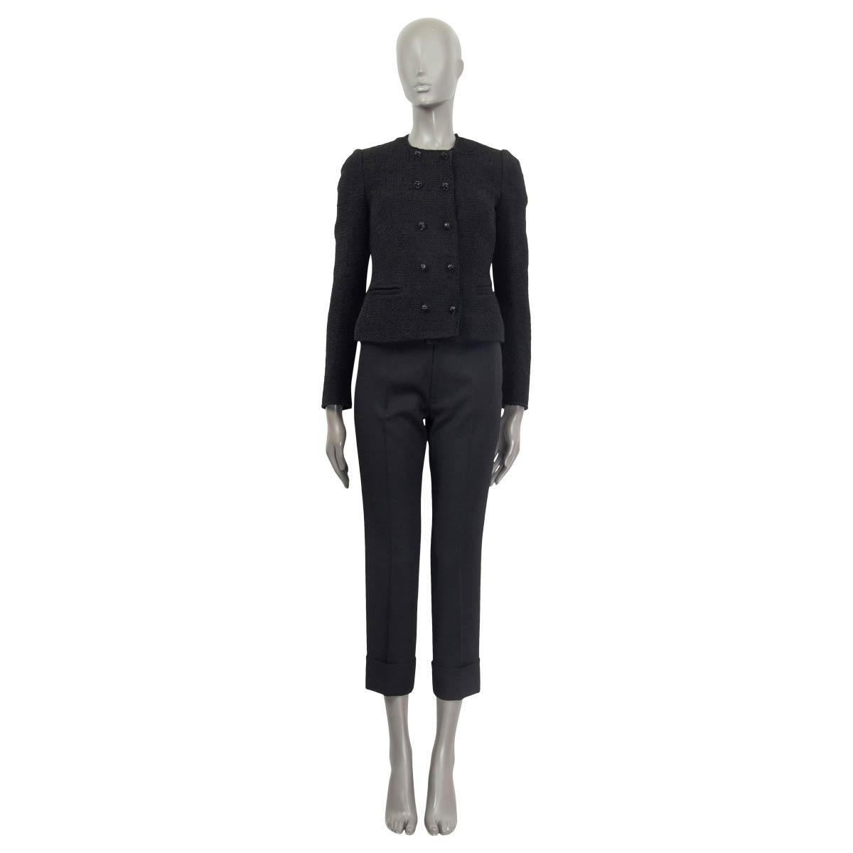 100% authentic Dolce & Gabbana double breasted tweed blazer in black wool (62%) and nylon (38%). Features buttoned cuffs and two sewn shut slit pockets on the front. Opens with ten black rose buttons on the front. Lined in brown and beige leopard