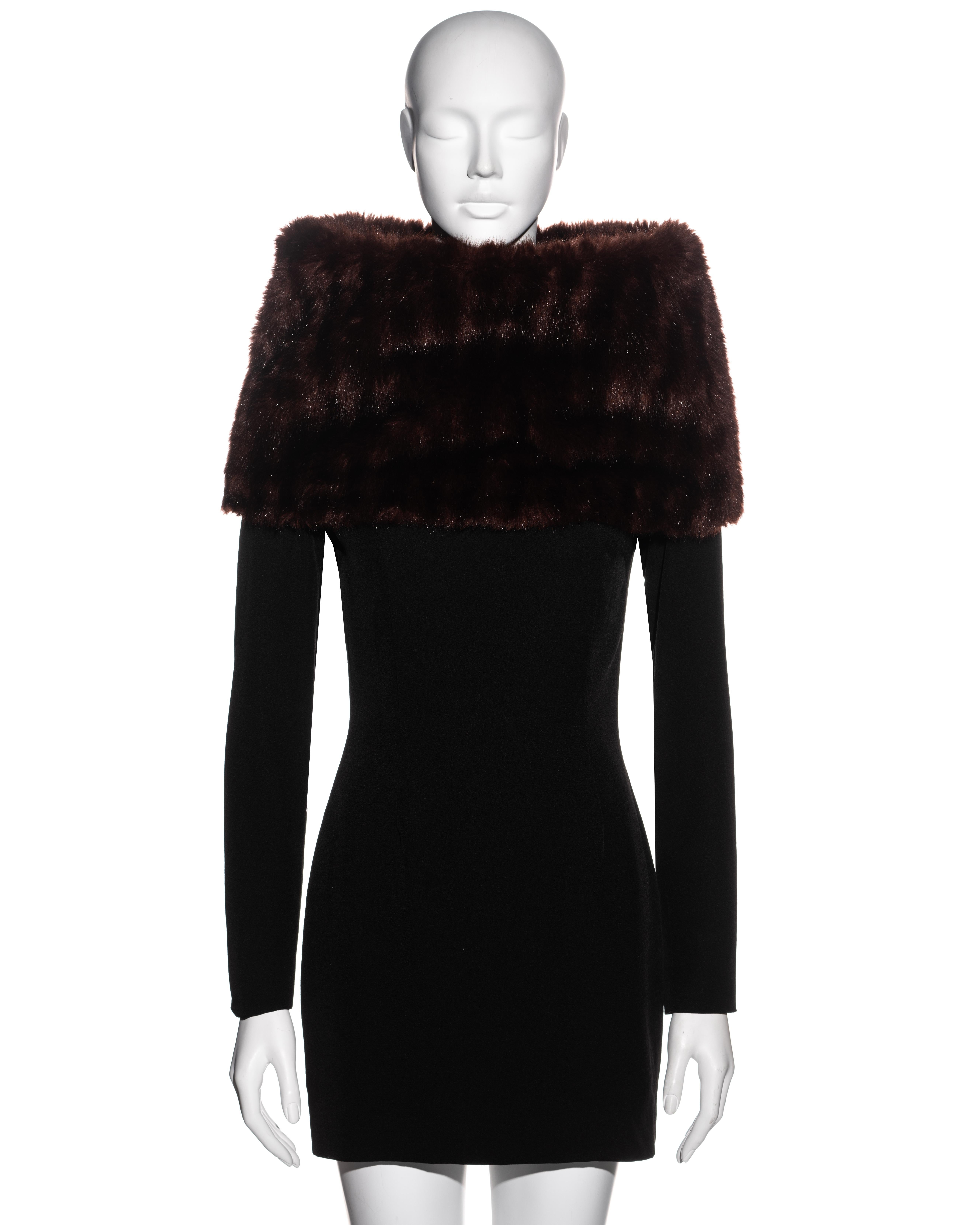 ▪ Dolce & Gabbana black wool mini dress
▪ Burgundy faux fur funnel neck which folds over the shoulders 
▪ Lined 
▪ Concealed zip fastening 
▪ IT 40 - FR 36 - UK 8 - US 4
▪ Fall-Winter 1995