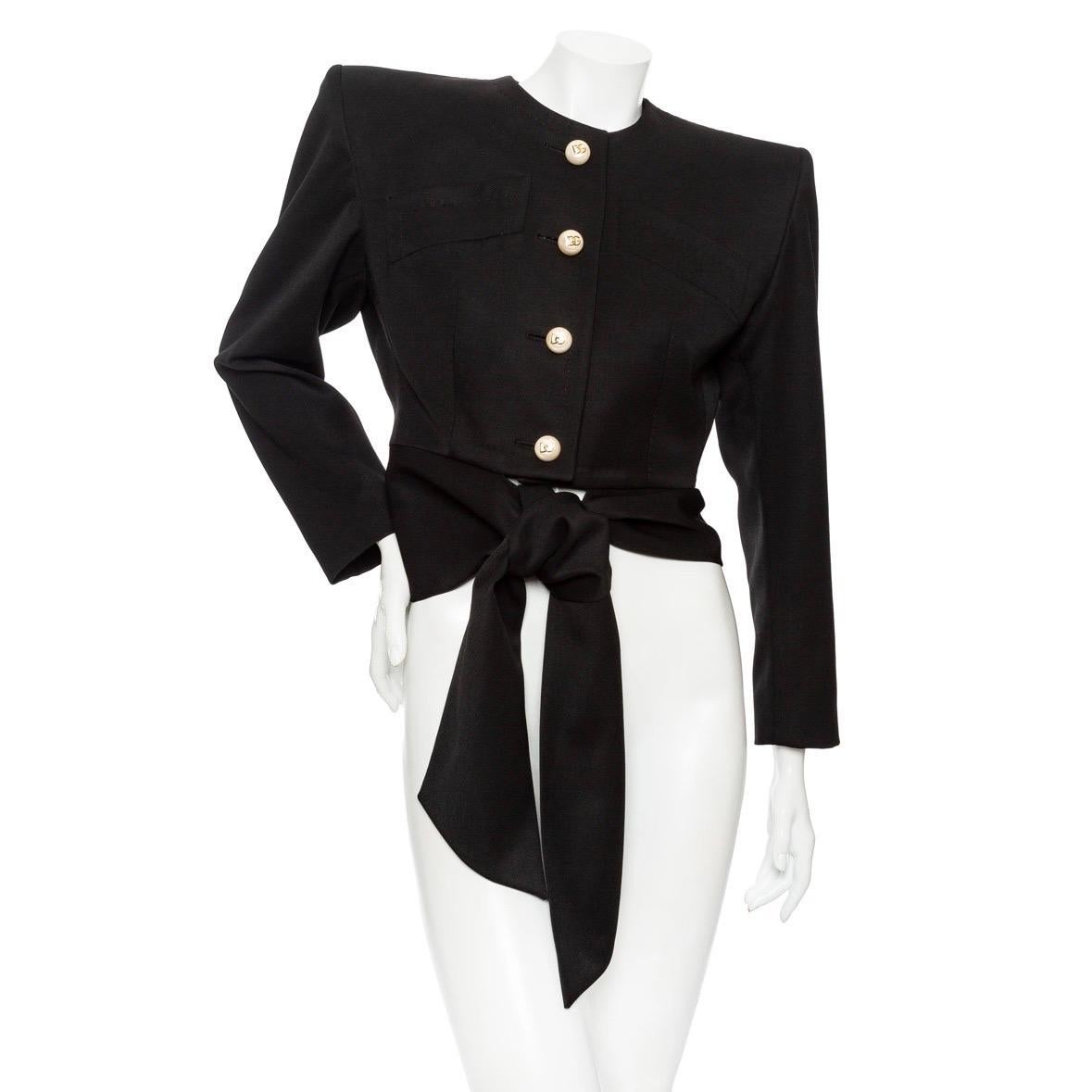Dolce & Gabbana Black Wool Structured Tie-Waist Blazer

Black
Structured shoulders
Front welt pockets
Fitted waist with attached self-tie
Pearly gold-tone DG buttons
Crop fit above tie
Made in Italy
100% virgin wool; 92% silk, 8% elastane (lining);