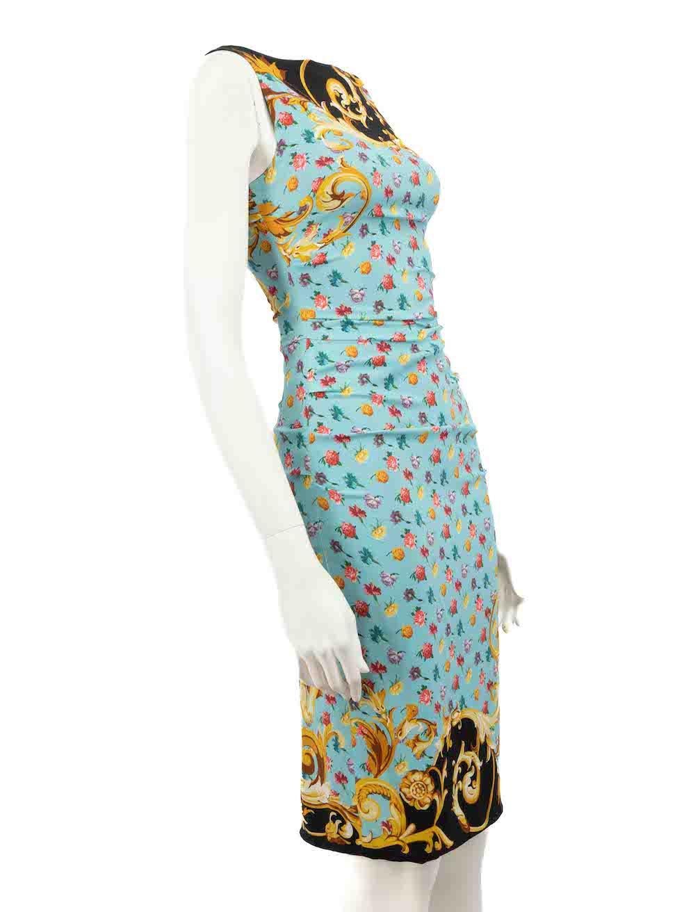 CONDITION is Very good. Minimal wear to dress is evident. Minimal wear to the front hem with pulls to the weave on this used Dolce & Gabbana designer resale item.
 
 Details
 Blue
 Silk
 Knee length dress
 Baroque floral pattern
 Ruched accent
