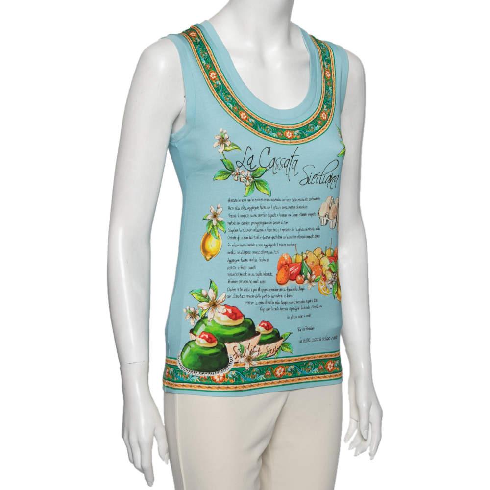 Be summer-ready with this simple yet chic tank top from Dolce & Gabbana. Made from cotton, the blue top features a unique tropical and written print on the front and will look lovely when paired with shorts or cropped pants. 