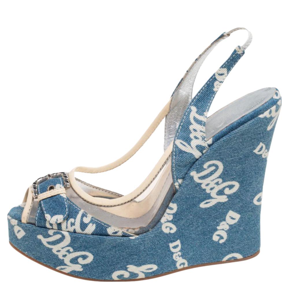 Keep your comfort at a maximum with these beautifully printed denim and PVC sandals. Let these gorgeous sandals from Dolce & Gabbana, equipped with uber-comfortable insoles and wedge heels, give you ease and style.