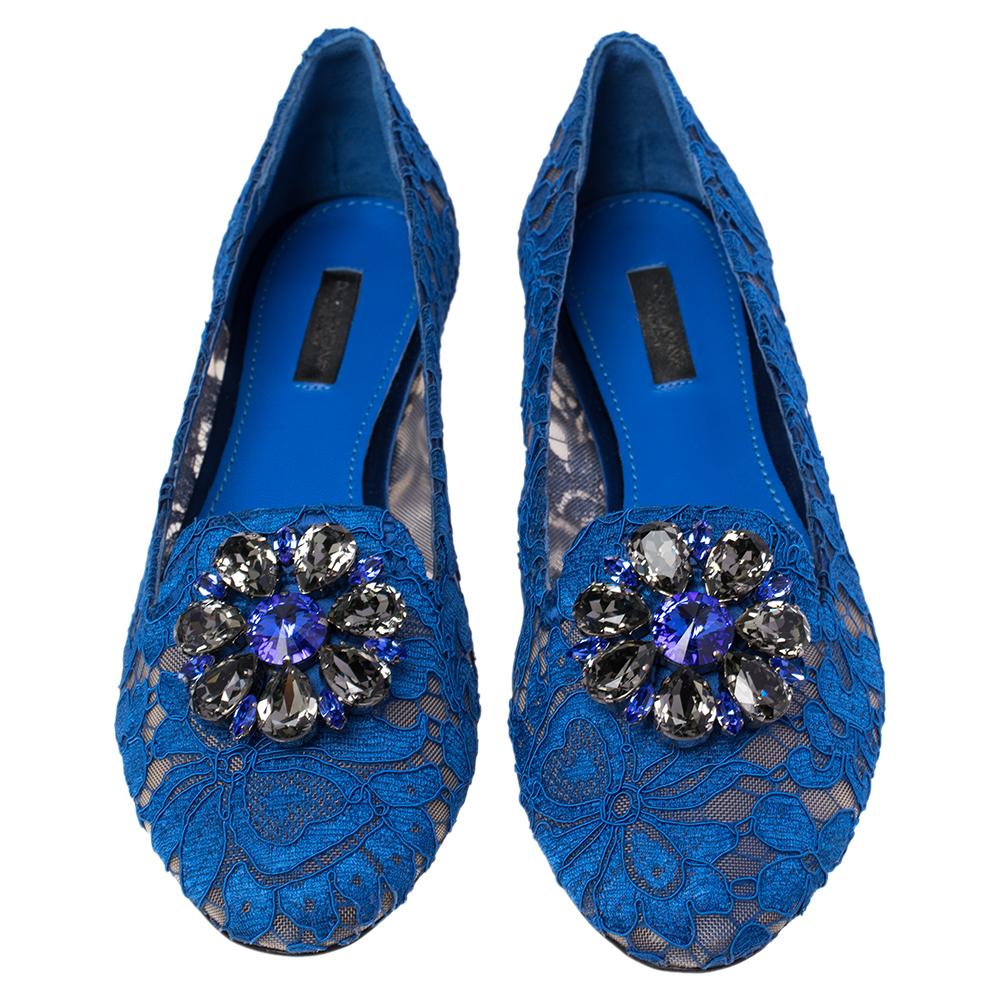 Draped in beautiful floral lace, these blue Dolce & Gabbana ballet flats are a sight to behold! They have been styled with almond toes and embellished with exquisite crystals on the uppers. Comfortable leather-lined insoles and durable outsoles
