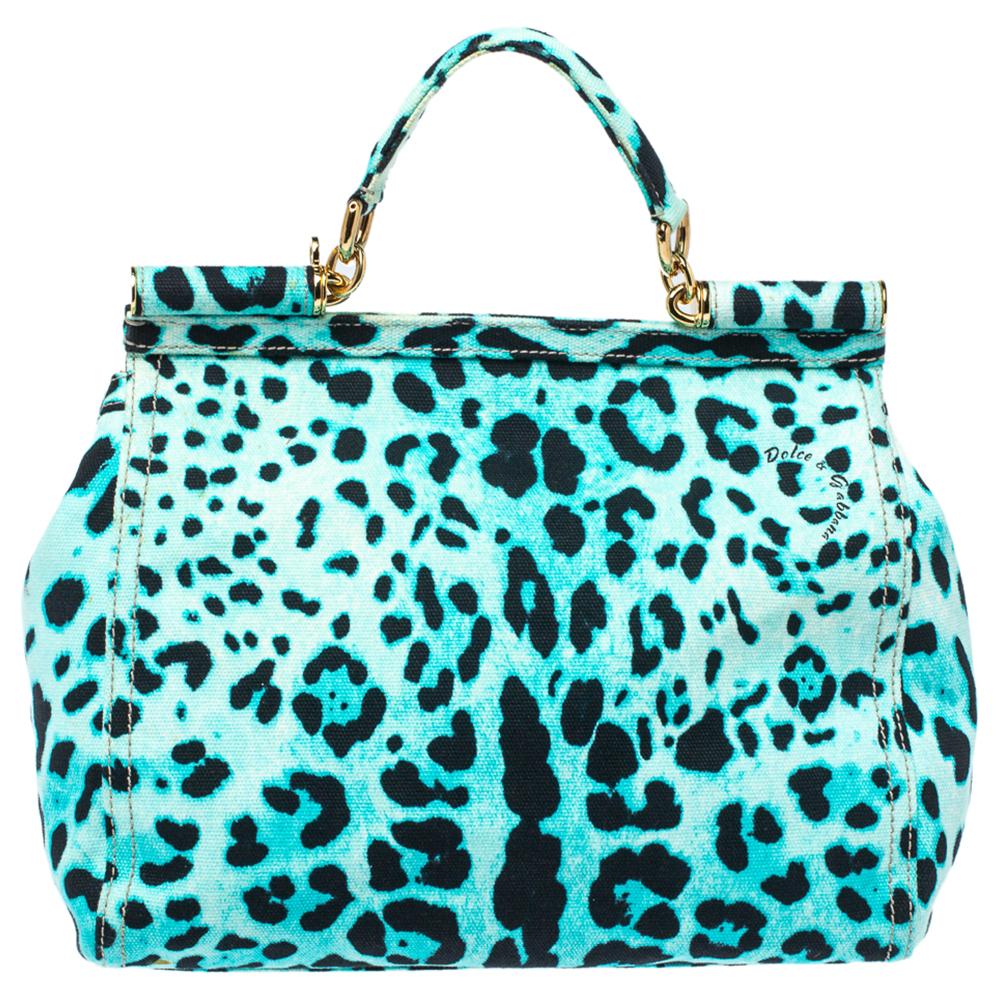 The Miss Sicily tote is one of the most celebrated creations from Dolce & Gabbana. The tote beautifully embodies the spirit of extravagance and feminity that the Italian luxury brand carries. Crafted from leopard-printed canvas in a blue hue, the