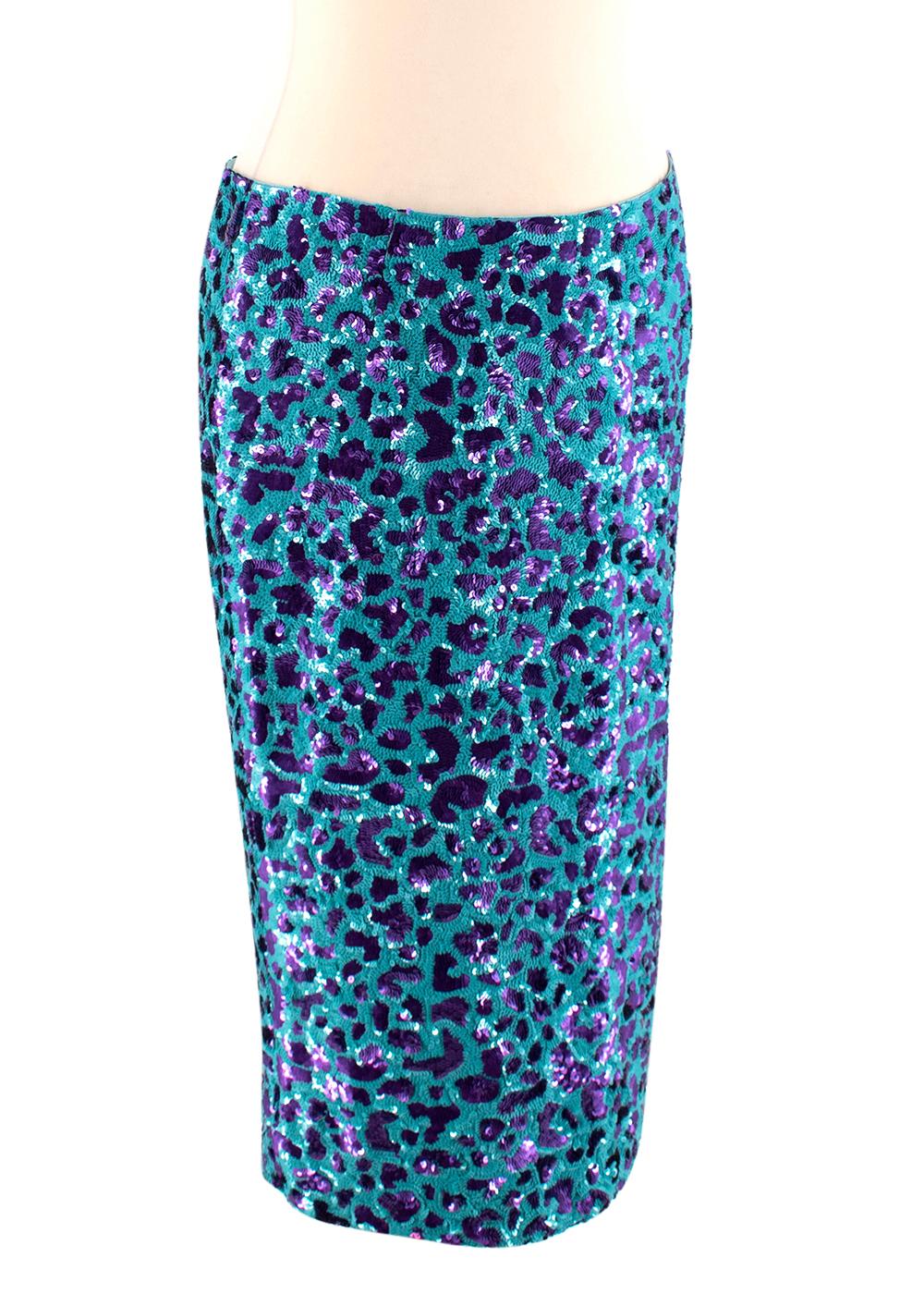 Dolce & Gabbana Blue & Purple Leopard Print Sequin Skirt

- Made of glamorous sequins 
- Gorgeous graphic leopard print 
- Cheerful blue and pink color combination 
- Classic pencil cut 
- Slit to the back 
- Zip fastening to the back 
- Fun elegant