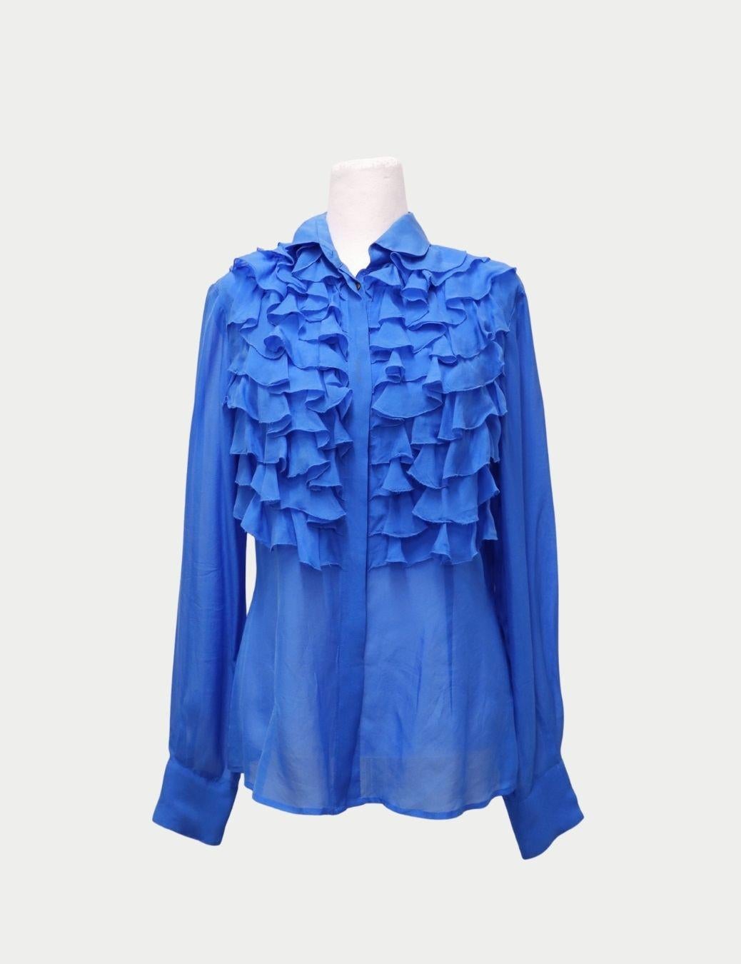 Dolce & Gabbana Blue Ruffle Front Blouse – Long Sleeve Lightweight Shirt

This striking Dolce & Gabbana blue ruffle blouse brings feminine drama and Italian sophistication to any wardrobe. Crafted from a lightweight, flowy fabric, the blouse