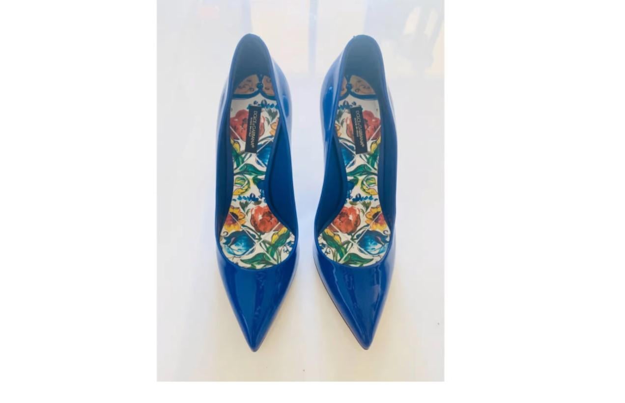 Dolce & Gabbana BLUE and Sicily Majolica printed insoles heels pumps shoes 
Size 38, UK5. 
Insole approx 24,5cm. 
Heel 9cm. 
100% leather (calfskin) 
Made in Italy 
Brand new with the original box! 

Please check my other DG items for clothing &