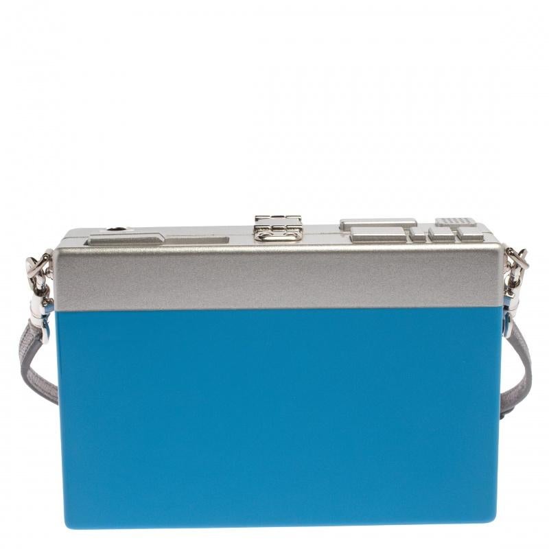 Dolce & Gabbana never fails to amaze us with their creations and this unique clutch is an example of their penchant for creating fun designs. The clutch is crafted in wood and designed in the shape of a walkman with a silver-tone padlock at the