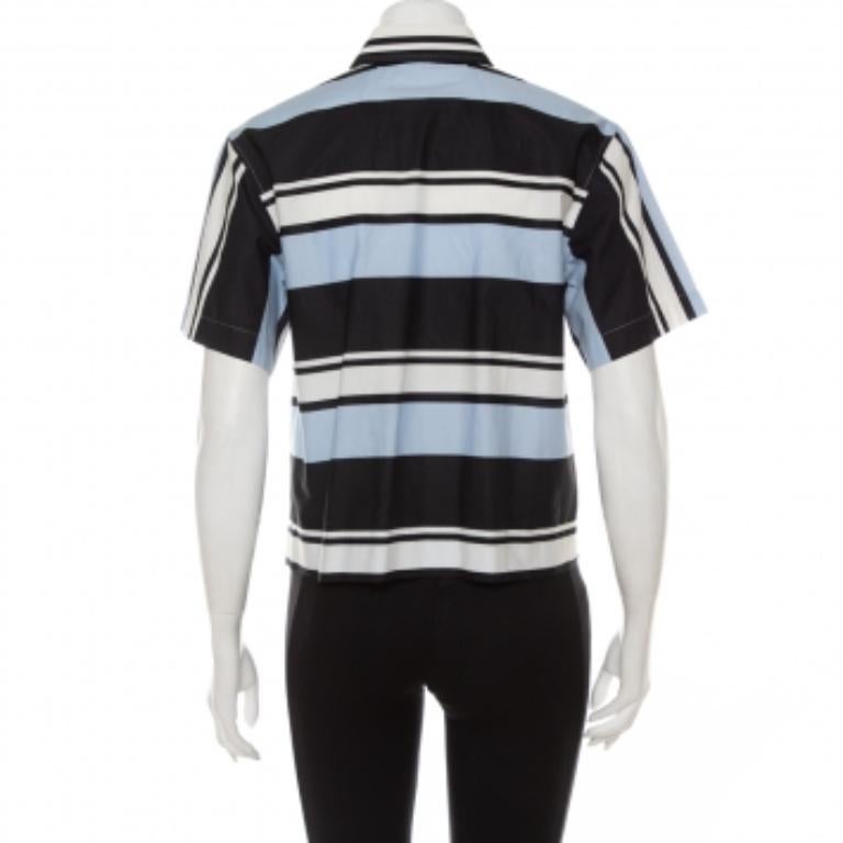 This cool shirt from Dolce & Gabbana is crafted from the finest quality cotton. The half-sleeved shirt has a striped pattern in black, blue, and white shades throughout.