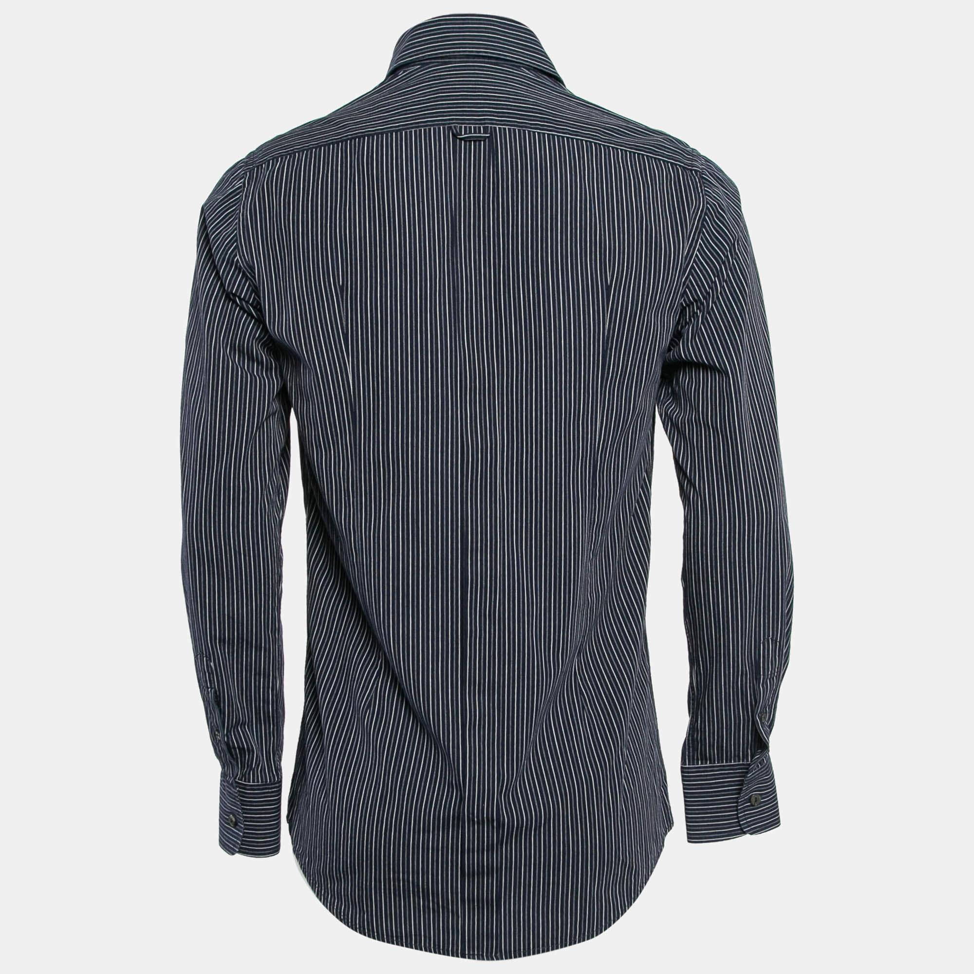 Shirts are an indispensable part of a wardrobe so this brand brings you a creation that is both versatile and stylish. It has been tailored from quality material in a versatile shade. The shirt is detailed with signature elements and a comfortable