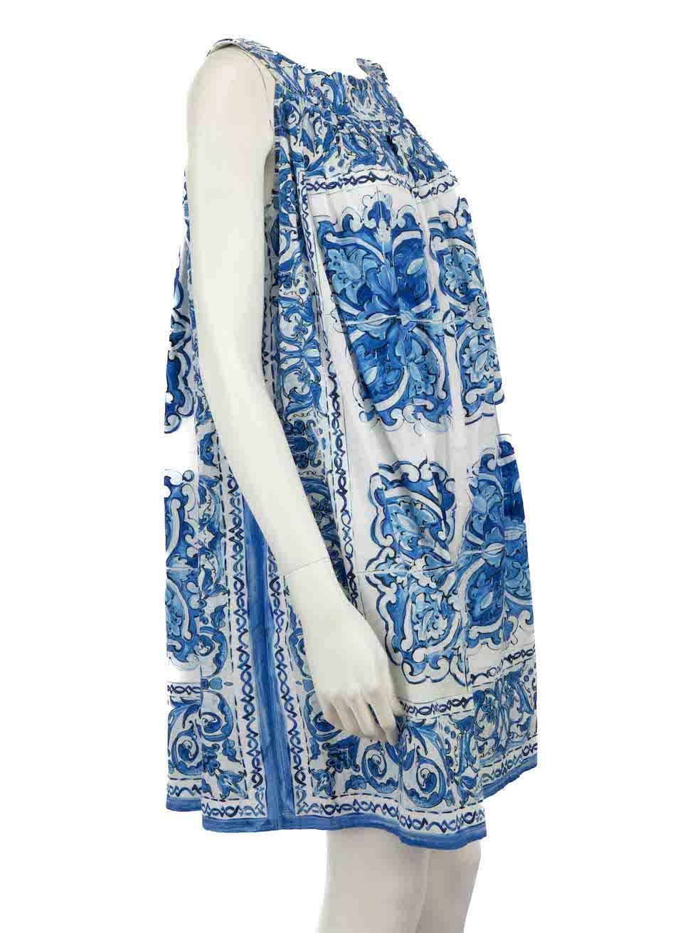 CONDITION is Very good. Minimal wear to dress is evident. Minimal wear to the neckline lining with light discolouration and a small mark to the front on this used Dolce & Gabbana designer resale item.
 
 Details
 Blue
 Cotton
 Dress
 Tiled print
