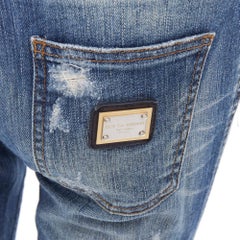 DOLCE GABBANA blue washed denim logo plate distressed jeans IT40 M