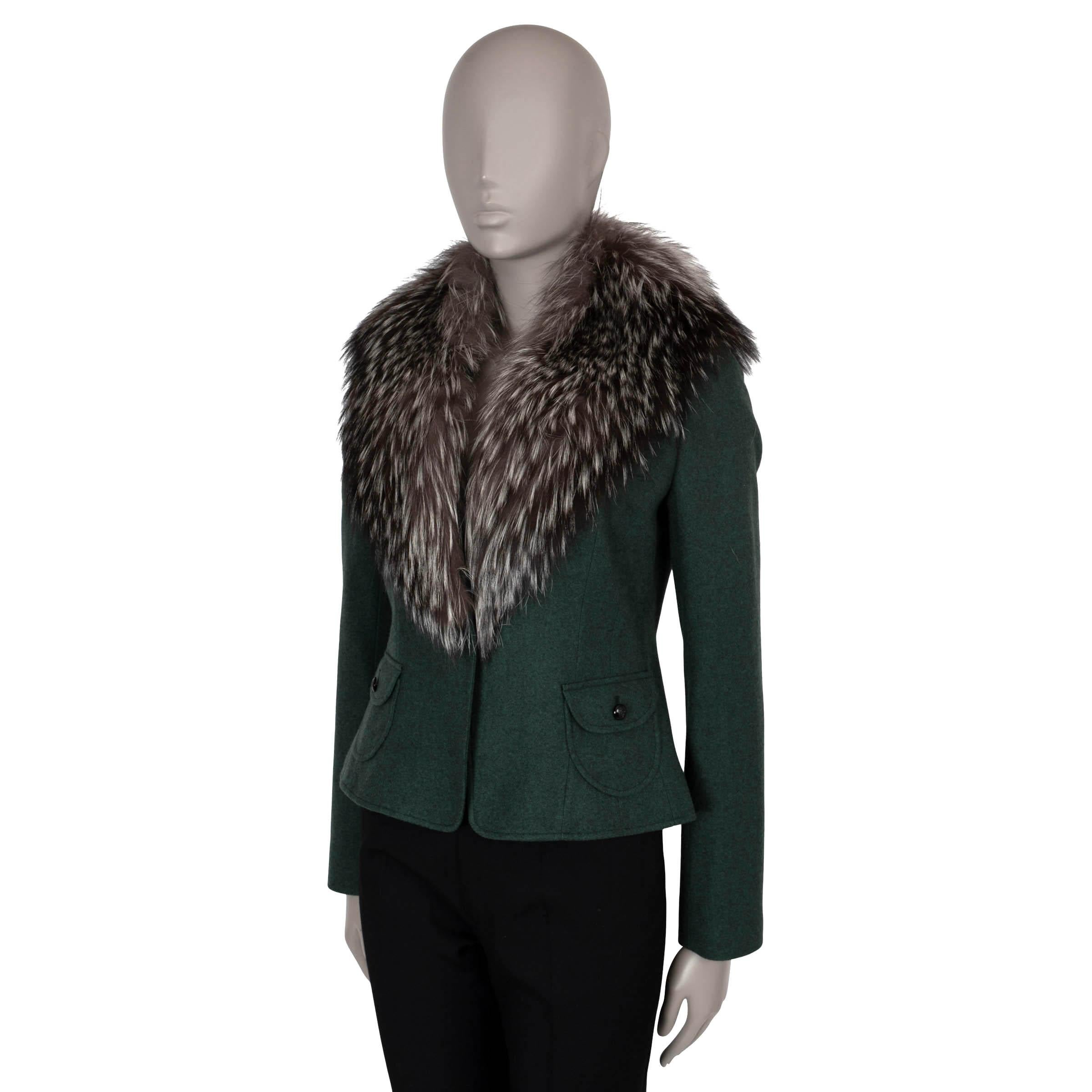 This 100% authentic Dolce & Gabbana jacket in bottle green wool (95%), nylon (3%), and elastane (2%) offers a striking blend of elegance and bold style. Featuring a fitted, short silhouette, it is accentuated by a luxurious beige and brown fox fur