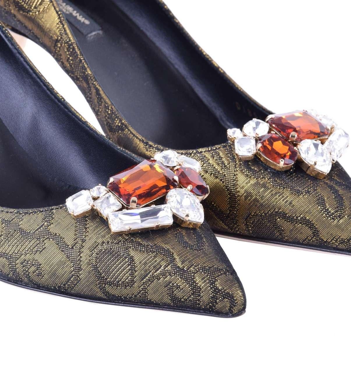 - Brocade Pumps BELLUCCI embellished with crystal brooch by DOLCE & GABBANA Black Label - MADE IN ITALY - New with Box - Former RRP: EUR 492 - Model: C18560-B9573-S8352 - Material: 49% Acetat, 46% Baumwolle, 5% Polyester - Sole: Leather - Color: