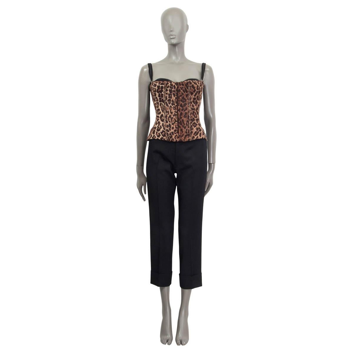 100% authentic Dolce & Gabbana Fall/Winter 1998 leopard printed corsette in brown and black silk (assumed cause tag is missing). Features lace details at the bust and lace straps. Opens with a zipper and a hook at the back. Unlined. Has been worn
