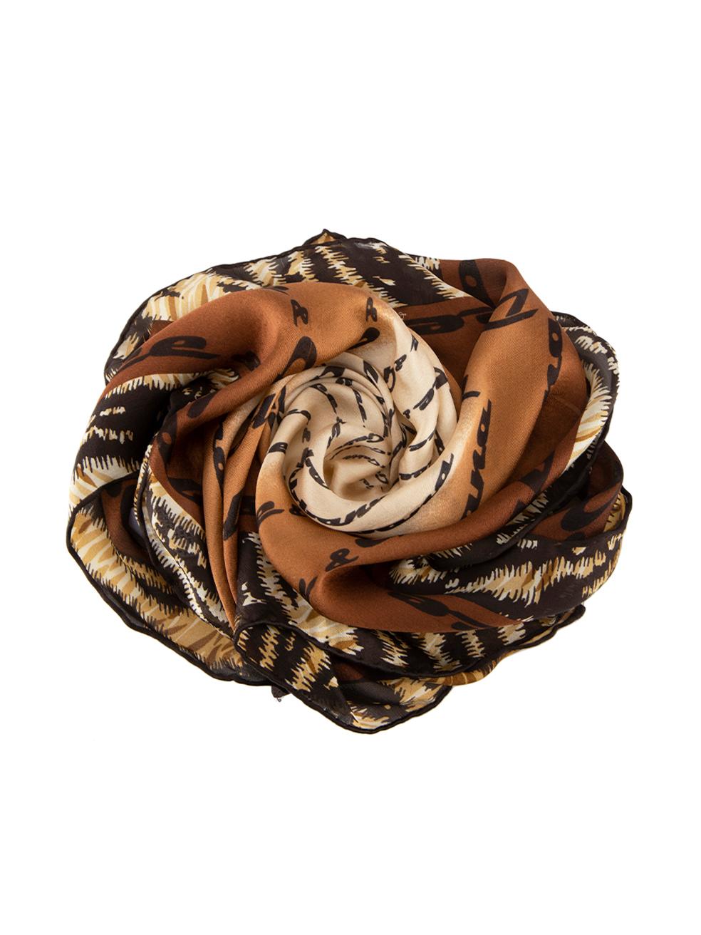CONDITION is Good. Minor wear to scarf is evident. Light wear to silk with a number of pulls to the weave troughout on this used Dolce & Gabbana designer resale item.



Details


Brown

Silk

Square scarf

Logo and animal print pattern





Made in