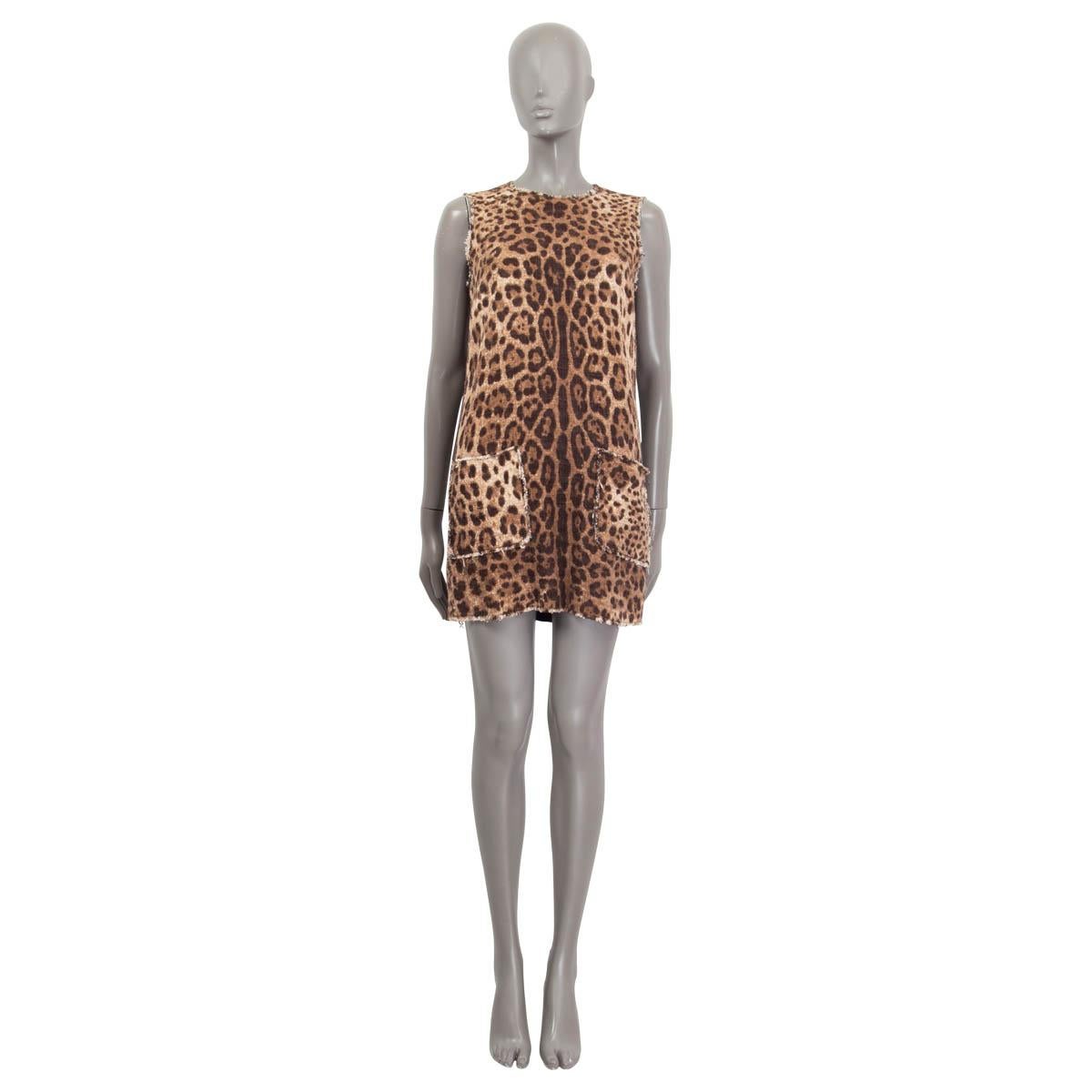 100% authentic Dolce & Gabbana leopard print tweed dress in brown and beige cotton (89%) and viscose (11%). Features two patch pockets on the front. Opens with a concealed zipper and a hook on the back. Lined in black silk (96%) and elastane (4%).