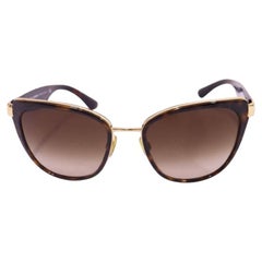 Dolce & Gabbana Braune Sonnenbrille mit Farbverlauf und goldenen Akzenten