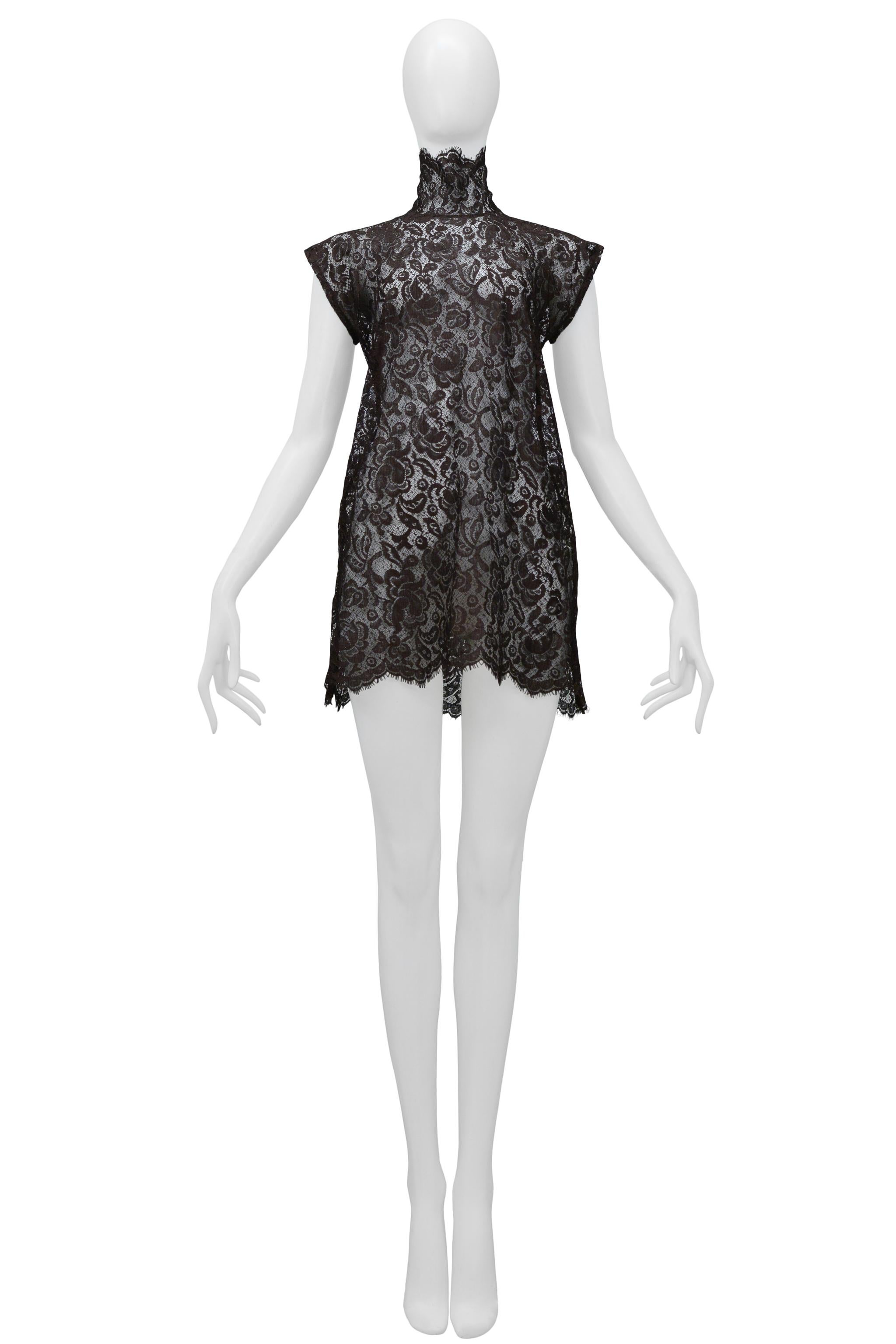 Resurrection Vintage is excited to offer a vintage Dolce & Gabbana brown lace mini dress featuring a high neck, cap sleeves, and center back zipper.

Dolce & Gabbana
Lace
38
Made in Italy
Excellent Vintage Condition 