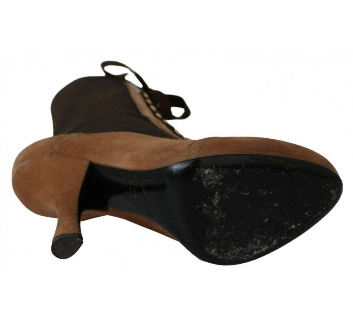 Donna Dolce & Gabbana, scarpe con stivali in pelle marrone in vendita