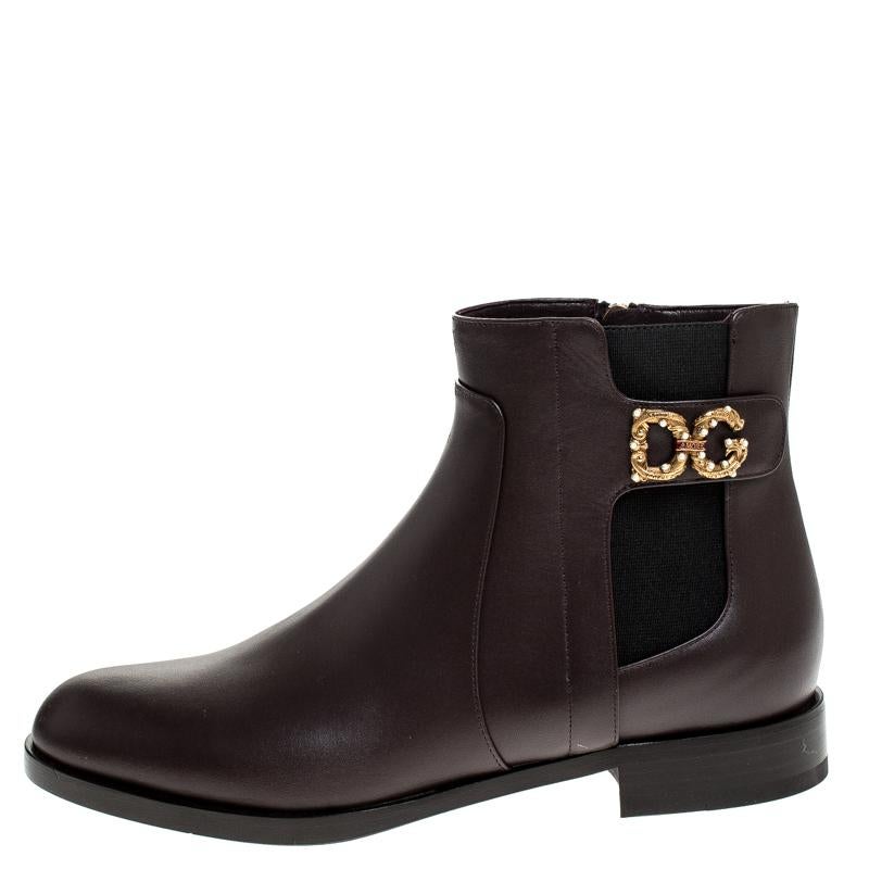 Any lover of luxury will agree that Dolce & Gabbana's designs are not only high on style but also comes from excellent workmanship, just like these brown ankle boots. Covered in leather and shaped wonderfully, these simple ankle boots have round