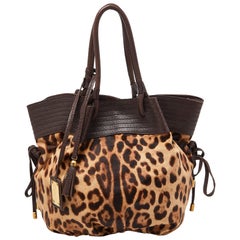 Dolce
Gabbana Brown Leopard Calf Hair and Leather Drawstring Hobo Dolce
Gabbana Brown Leopard Calf Hair and Leather Drawstring Hobo