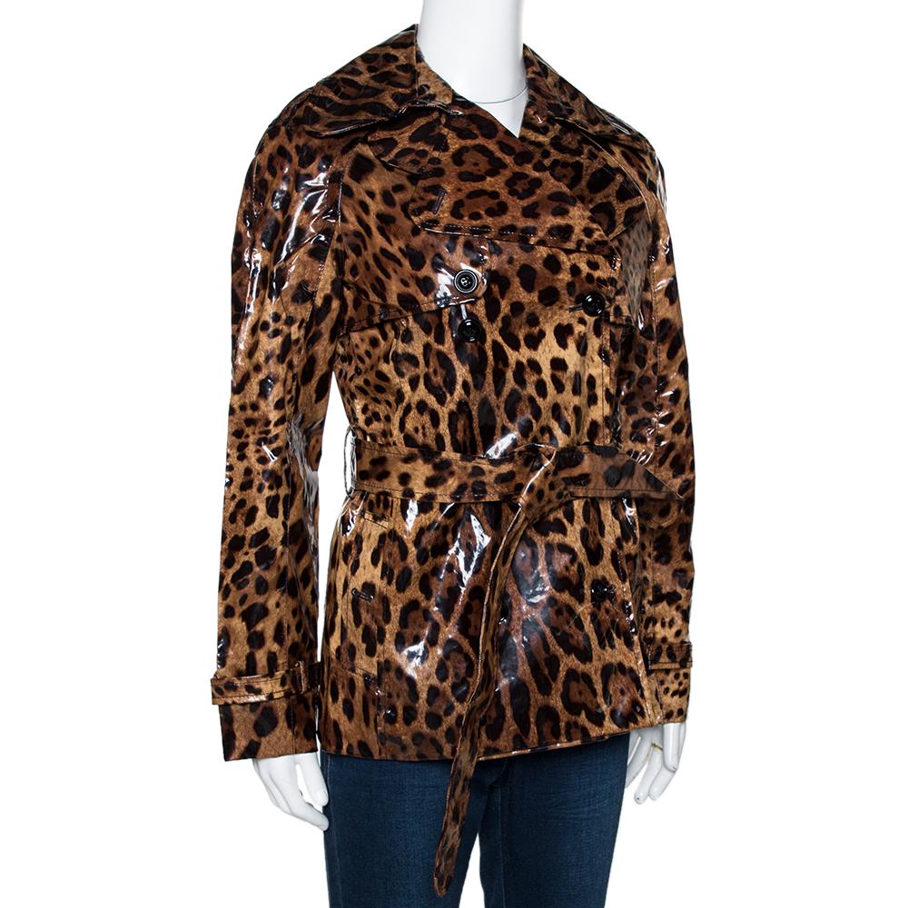 This statement-making trench coat comes from the house of Dolce & Gabbana. It has been crafted from quality silk and comes with leopard prints throughout. It has been styled with button front, long sleeves, a belt that cinches the waist and a