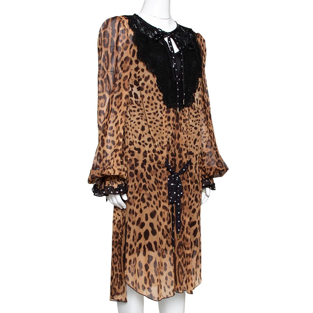 This kaftan dress from Dolce & Gabbana is a holiday staple; it is tailored with a cotton blend to a knee-length and can be carried in your luggage using minimum space. The kaftan has a brown leopard print all over and lace trims on the neckline.


