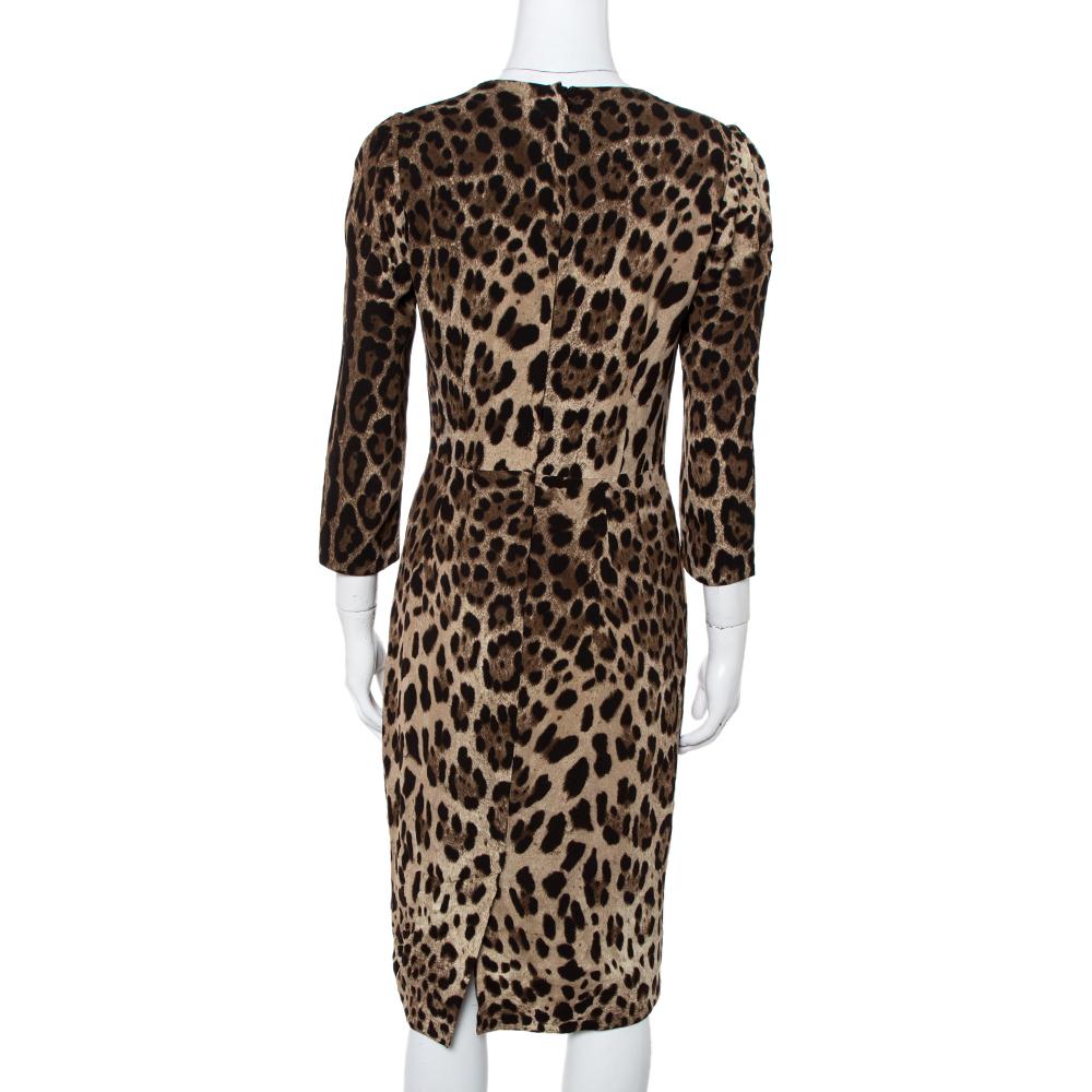 This remarkable dress is from Dolce & Gabbana! The crepe creation features a leopard print all over it and comes with a flattering silhouette. It flaunts a round neckline and three-quarter sleeves. Equipped with a concealed zip closure, it can be