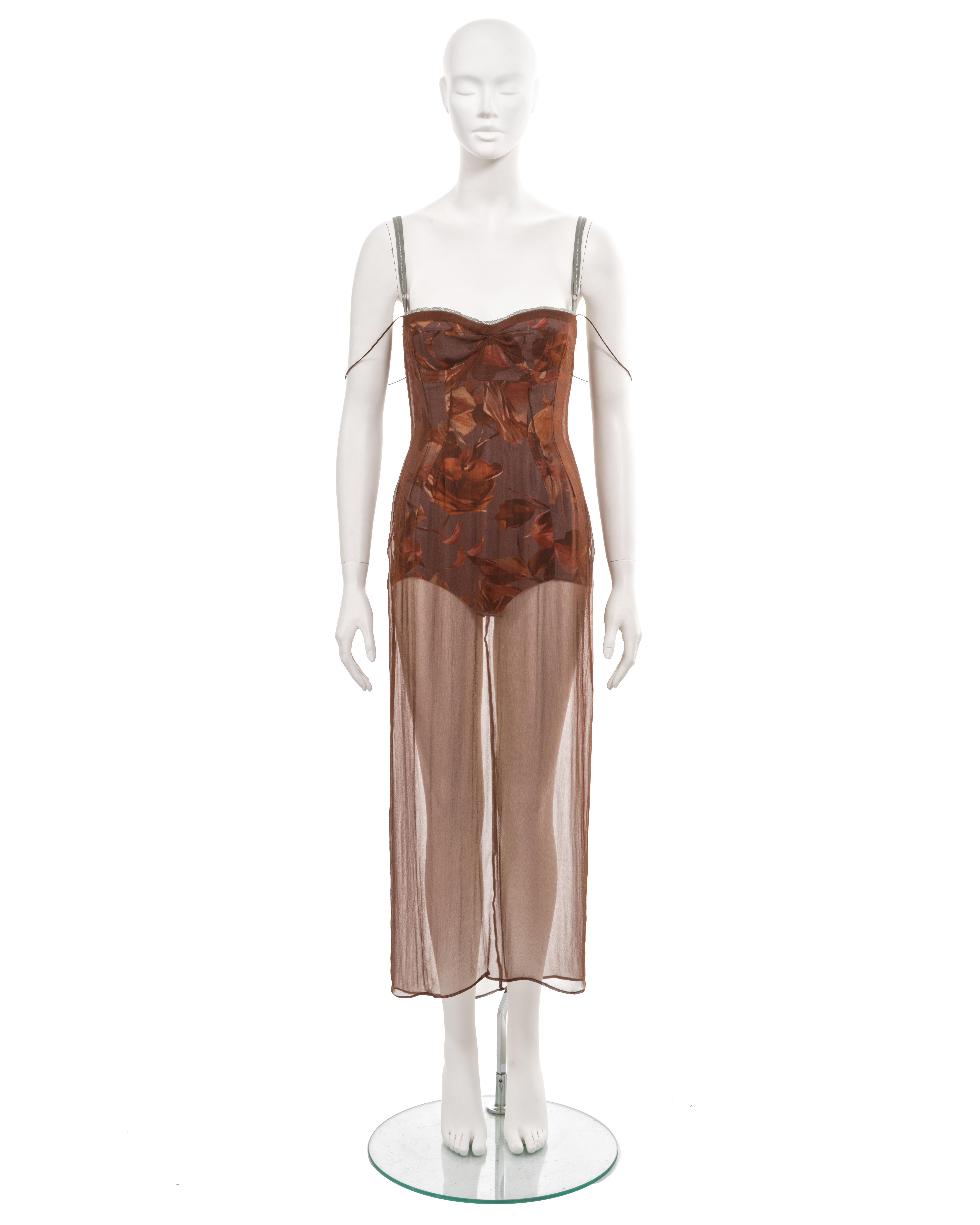 ▪ Dolce & Gabbana archival dress
▪ Sold by One of a Kind Archive
▪ Spring-Summer 1997
▪ Copper brown silk chiffon
▪ Built-in bodysuit with floral motif
▪ Corset boning 
▪ Hook-and-eye closures 
▪ Adjustable shoulder straps 
▪ Transparent