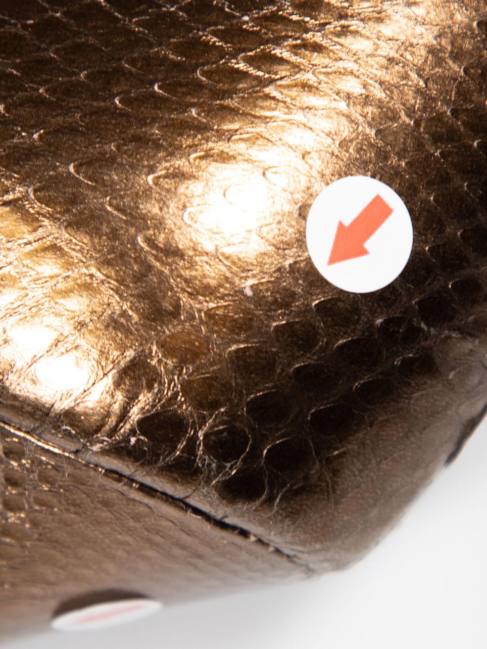 Dolce & Gabbana - Pompe in pelle di serpente marrone Taglia IT 37.5 in vendita 1