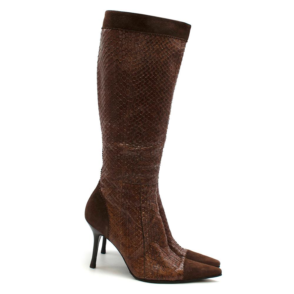 Dolce & Gabbana Brown Snakeskin & Suede Heeled Vintage Long Boots

- Made of luxurious snakeskin 
- Neutral brown hue 
- Classic shape 
- Pointy toes
- Suede details 
- Zip fastening to the sides 
- Stiletto heels 
- Branded silver tone hardware 
-