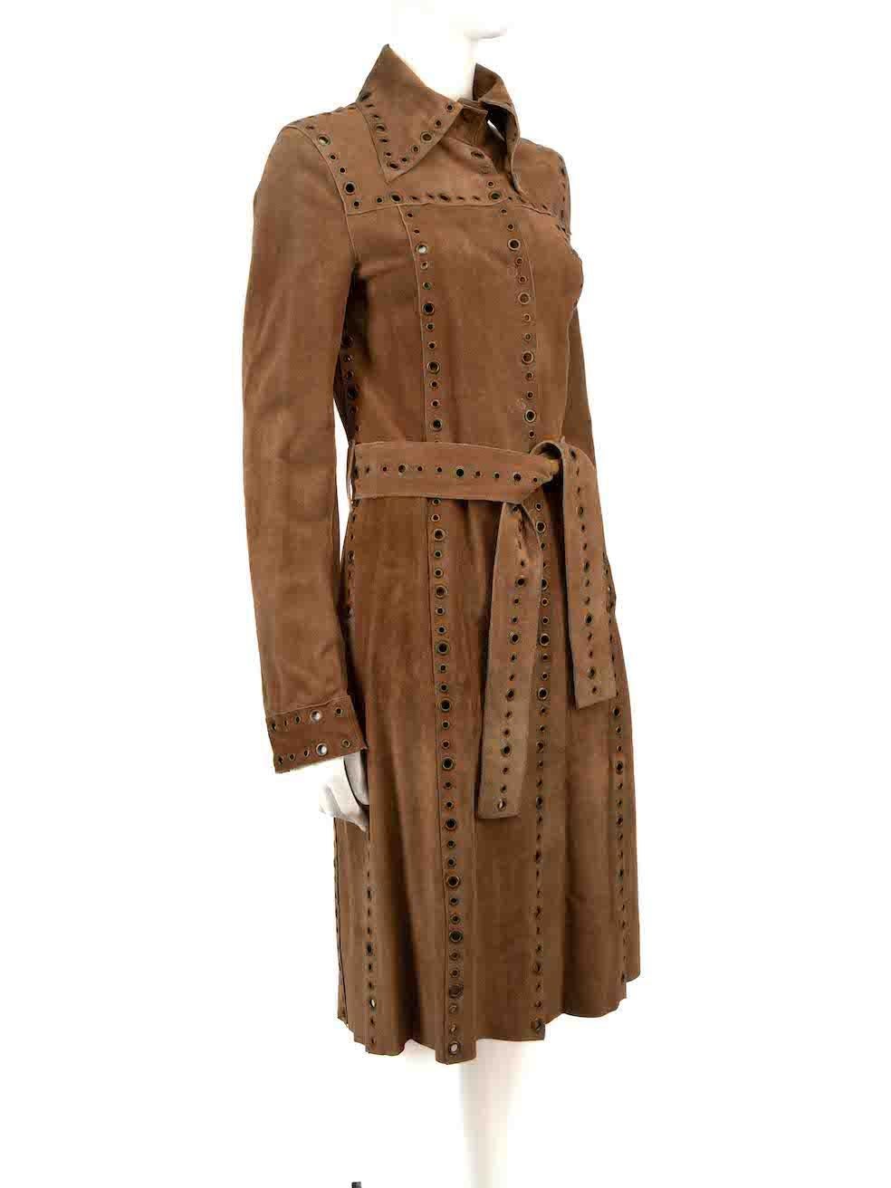 CONDITION is Very good. Minimal wear to the coat is evident. Light discolouration to the inside waist areas on this used Dolce & Gabbana designer resale item.
 
Details
Brown
Suede
Coat
Eyelet detail
Belted
Snap button fastening
2x Side pockets
