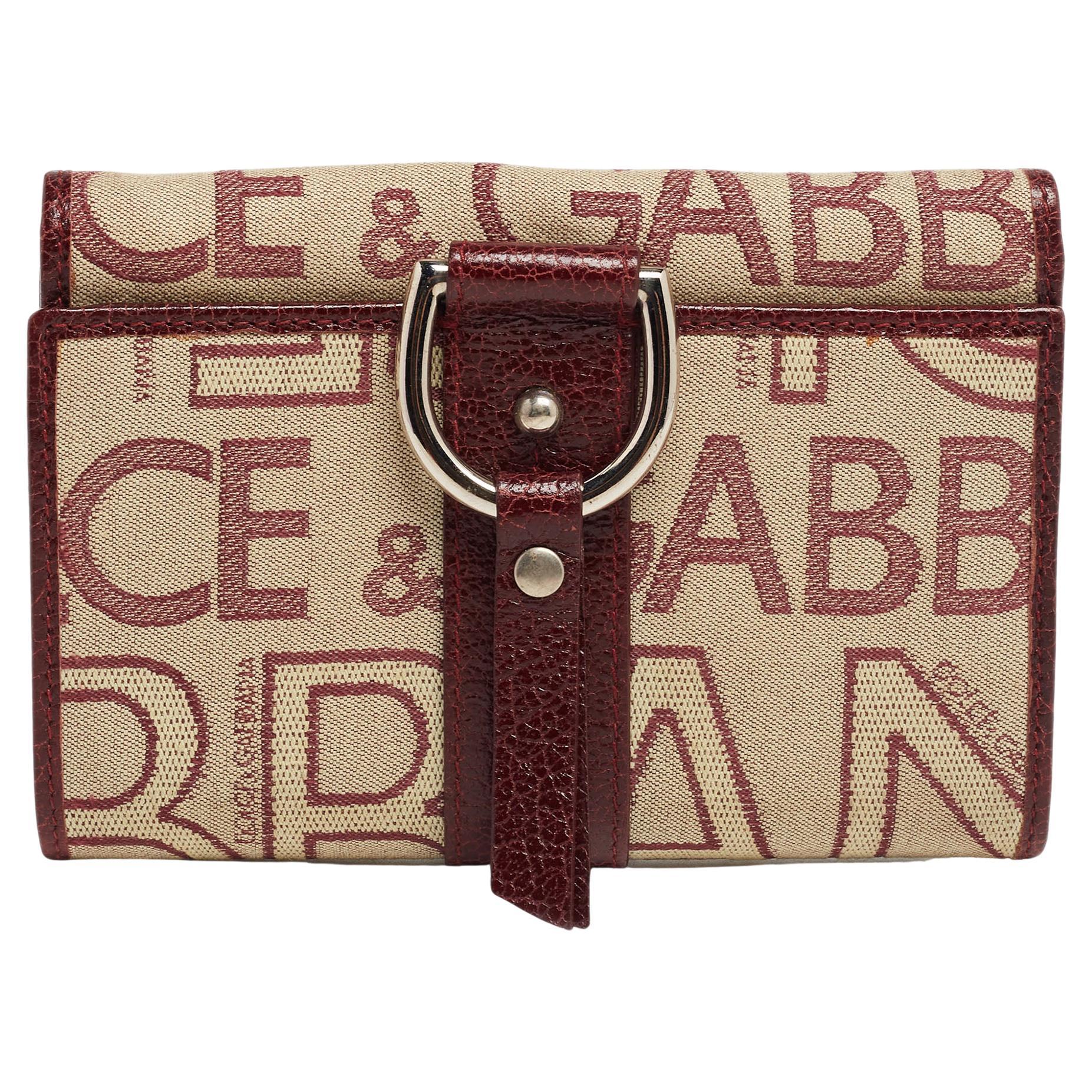 Dolce and Gabbana Burgundy Monogram Fabric and Leather D Ring Trifold  Wallet For Sale at 1stDibs