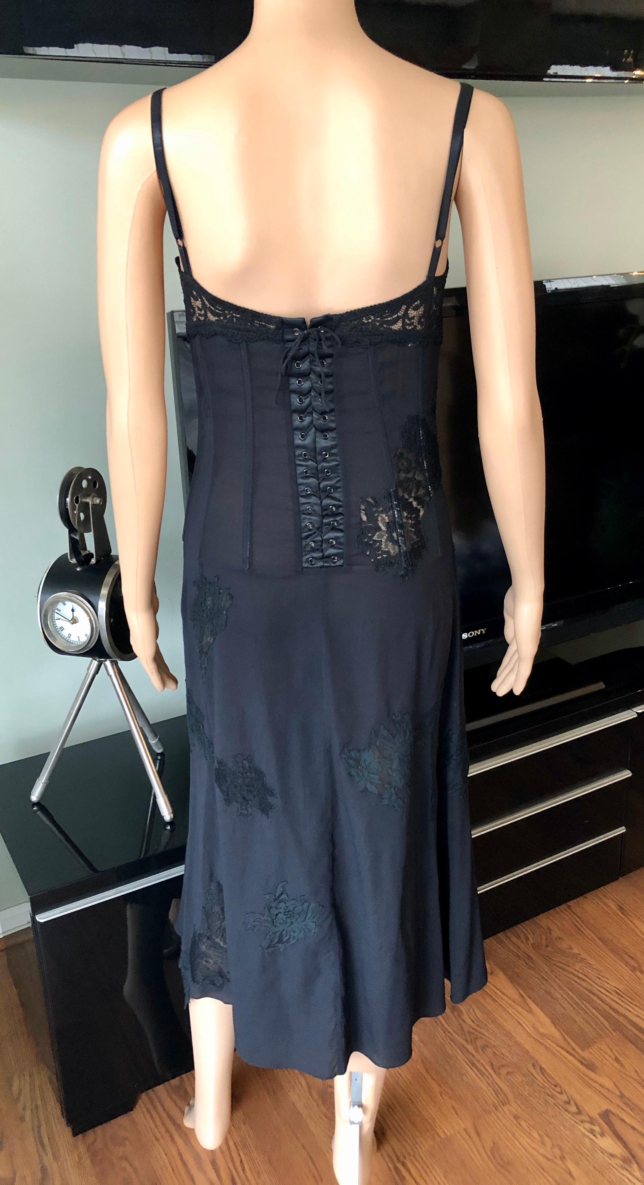 Dolce & Gabbana c. 2000 Sheer Silk and Lace Corset Ties Accented Black Dress IT 42

Dolce & Gabbana silk black midi dress featuring lace accents throughout, bustier neckline, adjustable narrow straps, structured bodice and concealed zip closure at