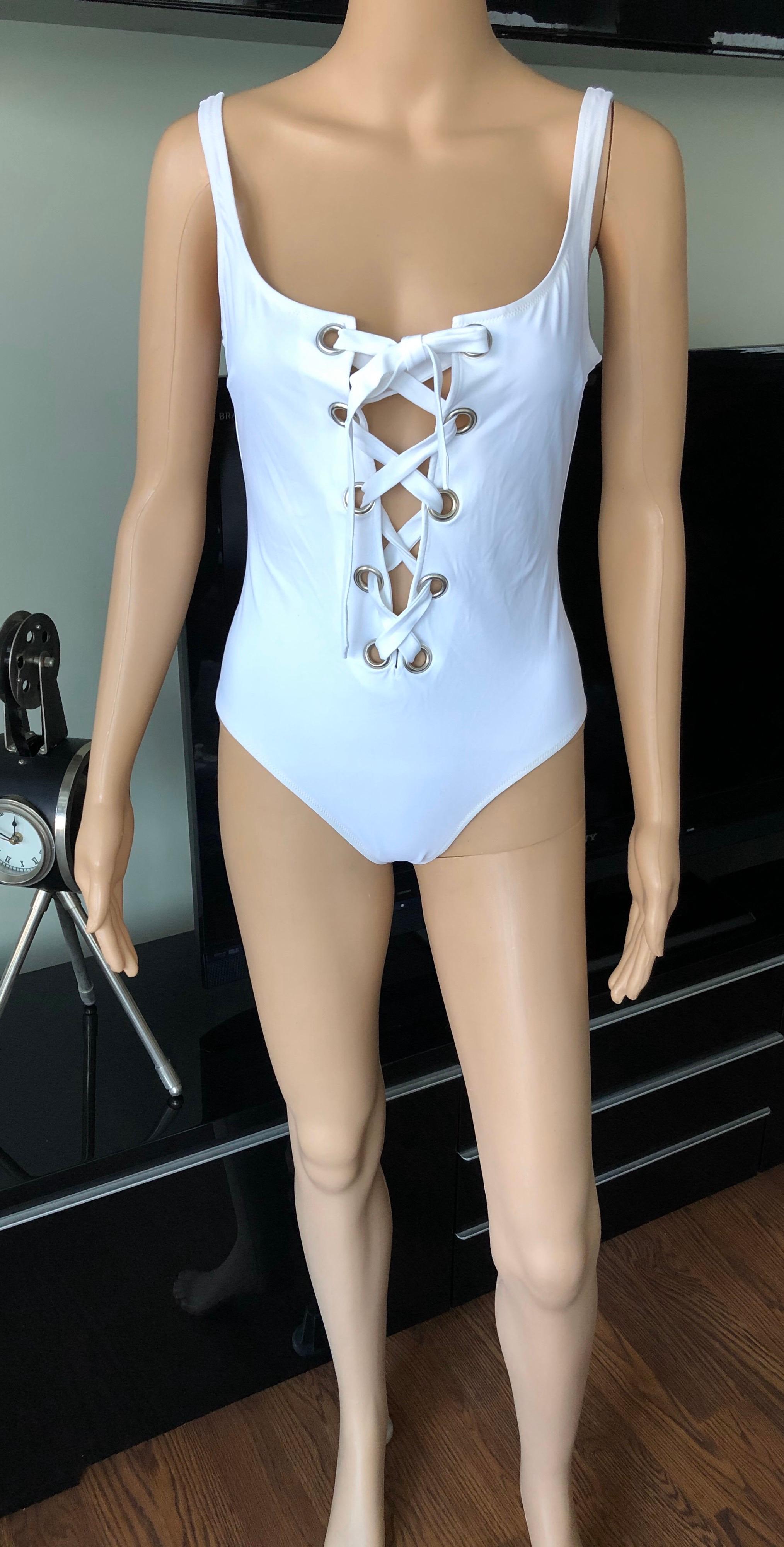 Dolce & Gabbana c. 2003 Plunging Lace Up Corset Backless White Swimsuit Bodysuit Size 4

Excellent Condition - Flawless

Please find the approximate measurements below: 
Chest: 32-50