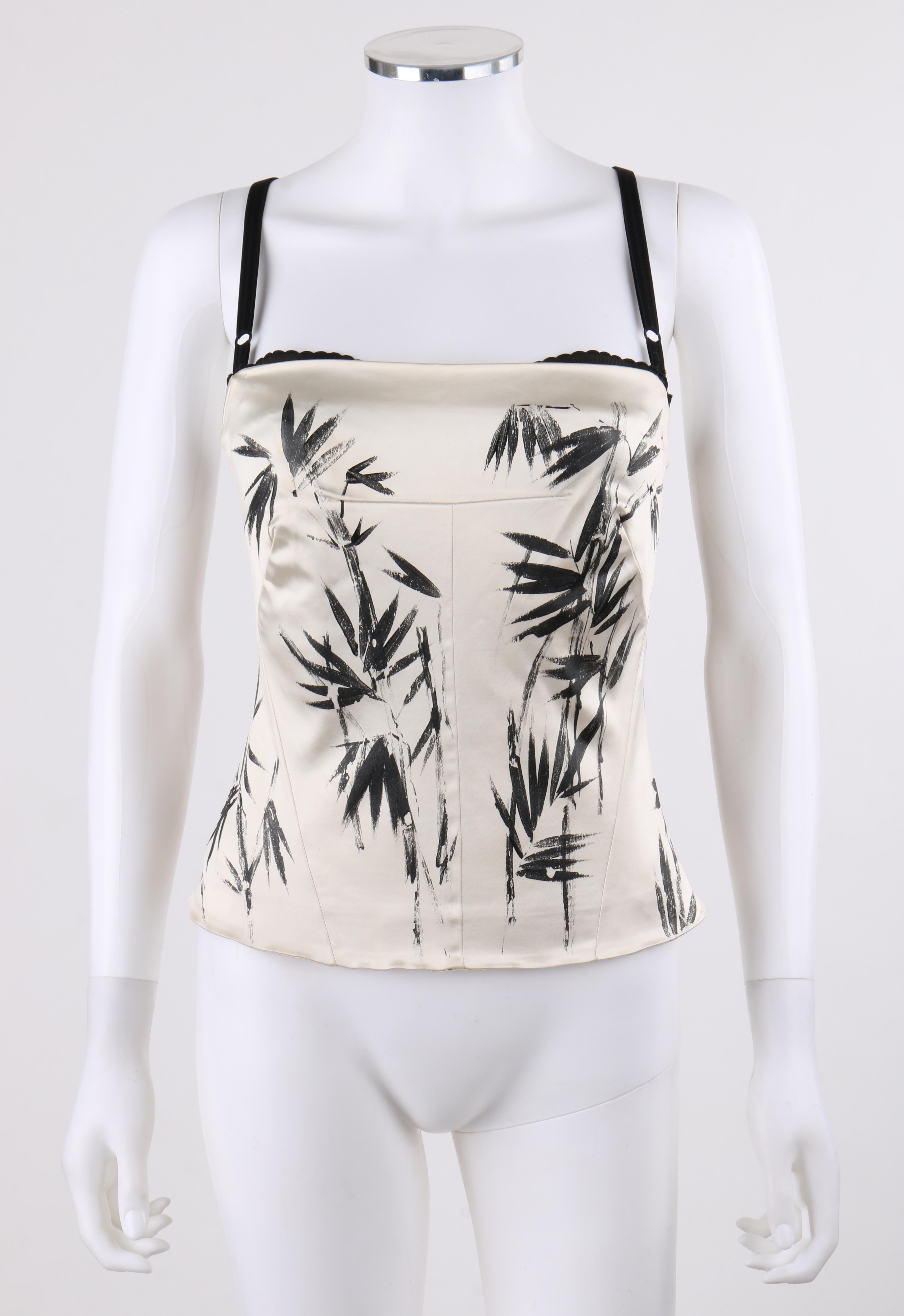DOLCE & GABBANA c.2000’s Ivory Black Hand Painted Bamboo Leaf Corset Bustier Top
 
Brand / Manufacturer: Dolce & Gabbana 
Style: Corset, bustier top
Color(s): Shades of ivory and black
Lined: Yes       
Unmarked Fabric Content: Satin  
Additional